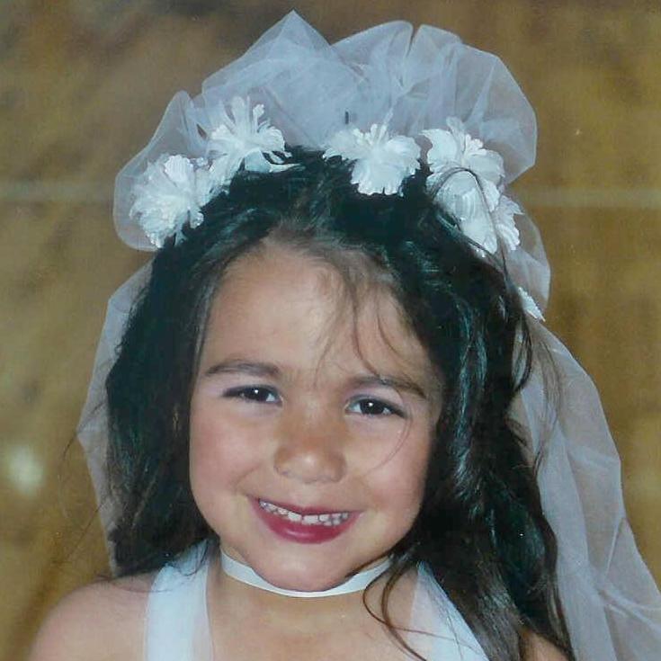 When Amanda was a young girl, she wore a wedding dress and veil for her dance recital!