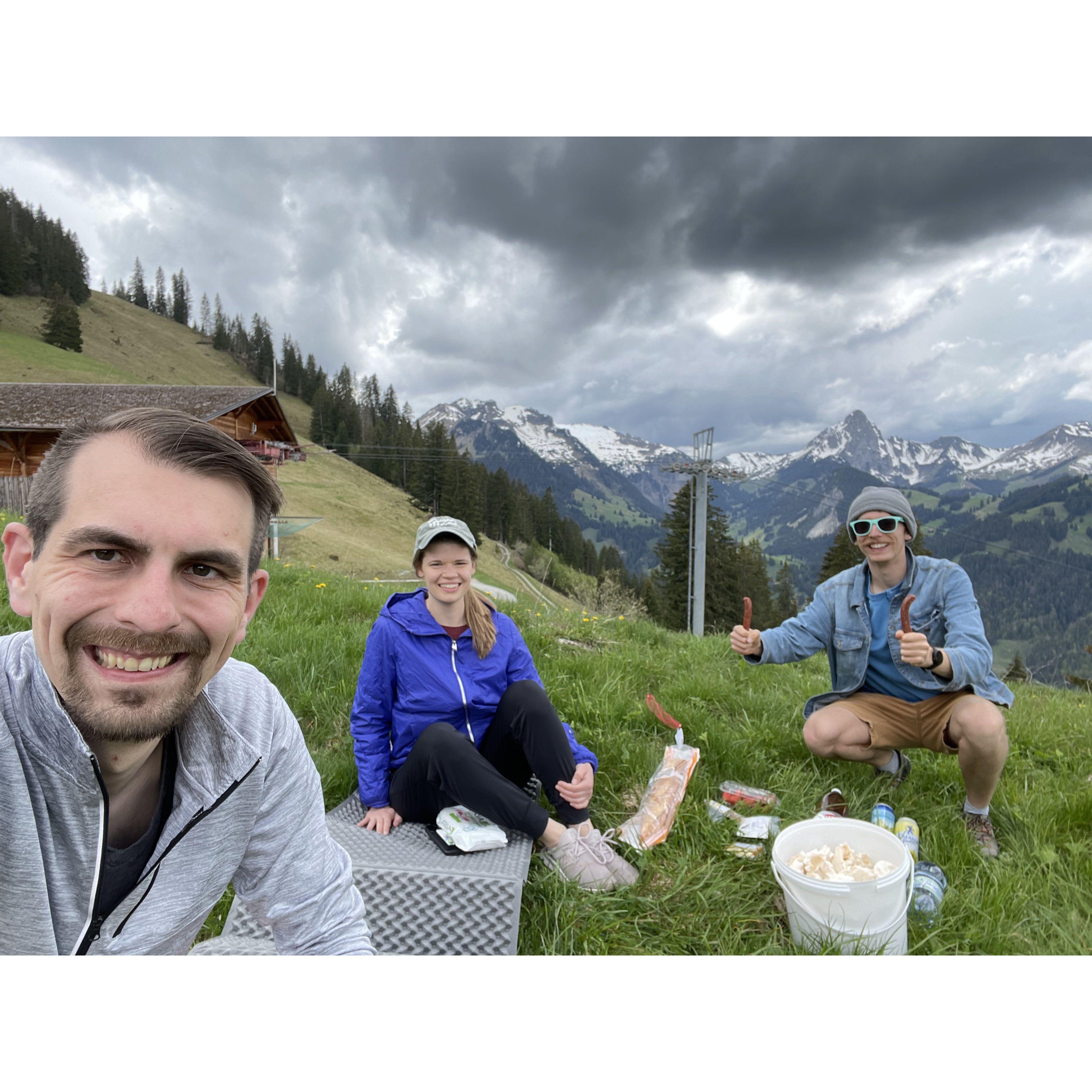 Mountain Side Picnic featuring Sausage, Cheese, Bread, Beer, and a bucket full of Meringues!!!   | Switzerland (May '24)