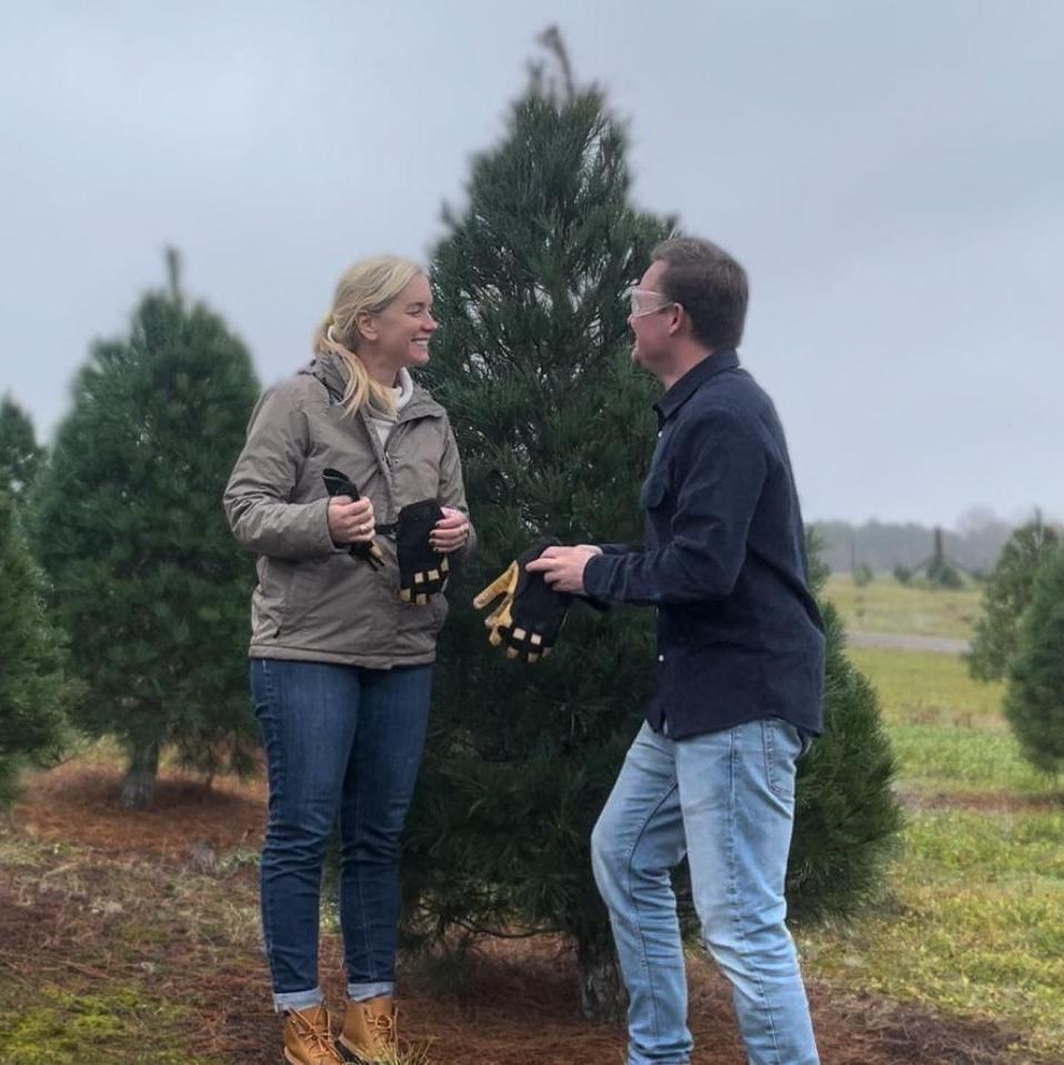 Cutting down Teri's first real Christmas tree
