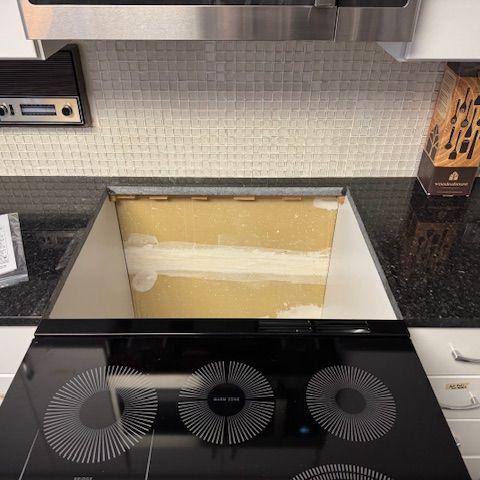 We knew the oven needed replacing but we didn't know a new one would not fit in the hole...