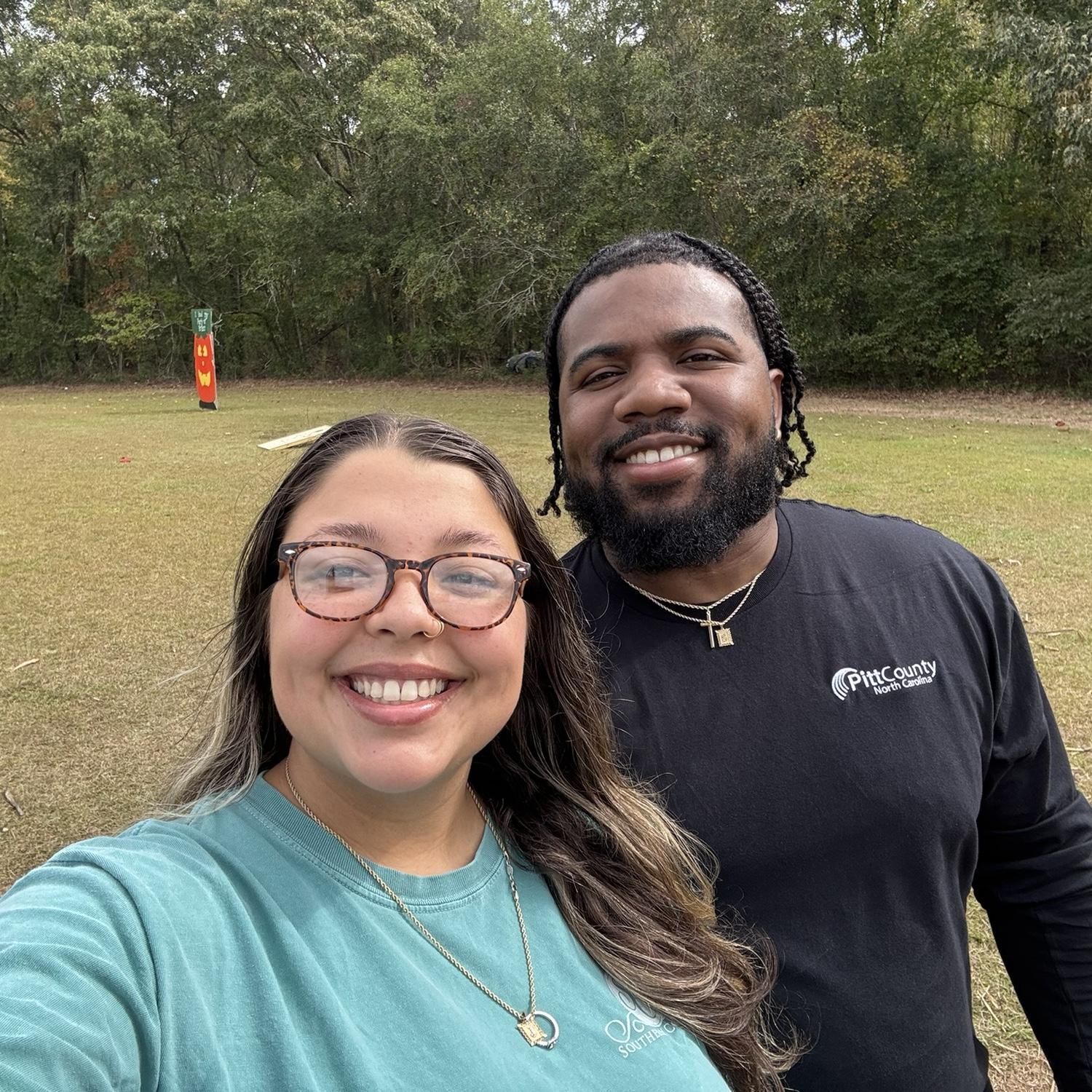 Us having fun at the pumpkin patch, before we went into the corn maze!