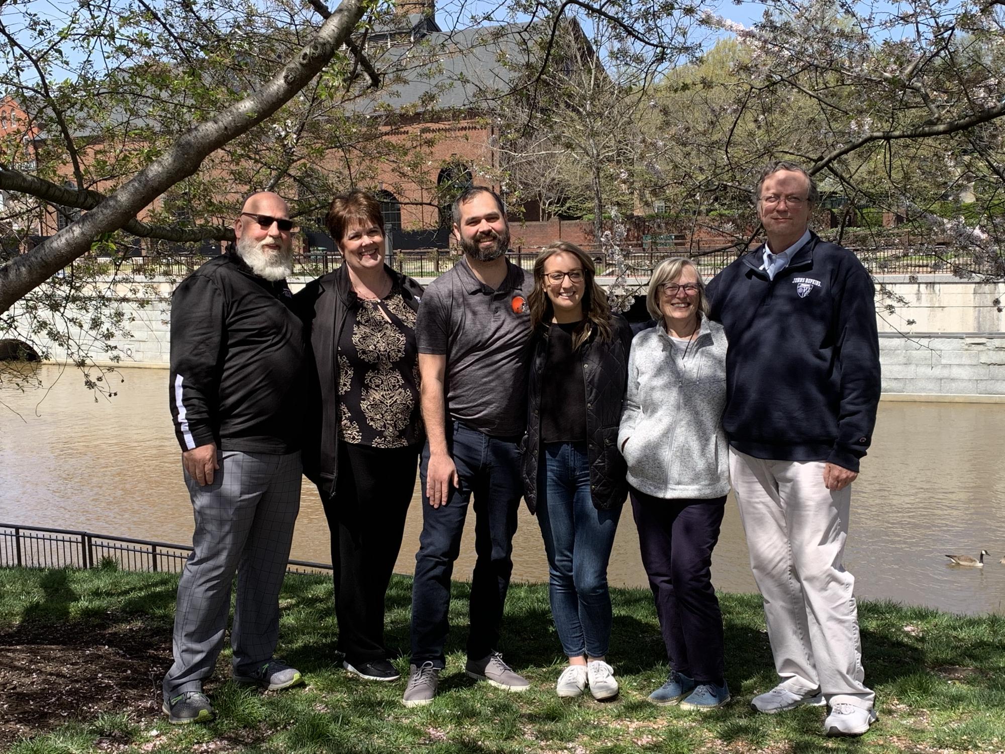 Us with our parent’s right after getting engaged in Richmond, VA on Browns Island. April 2021