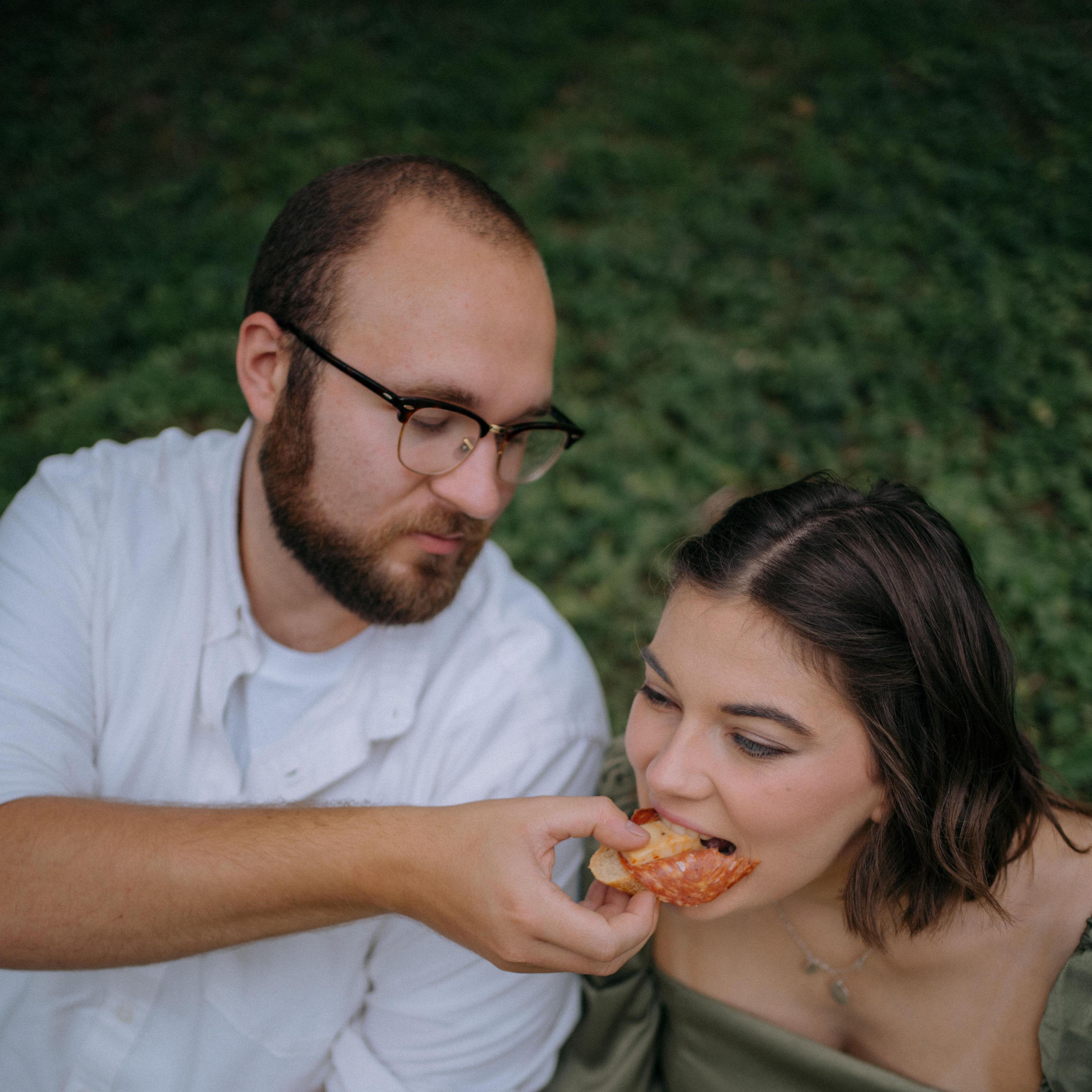 Pre-engagement photos by Heather McDearman. July 2022. Keeping away the hangry.