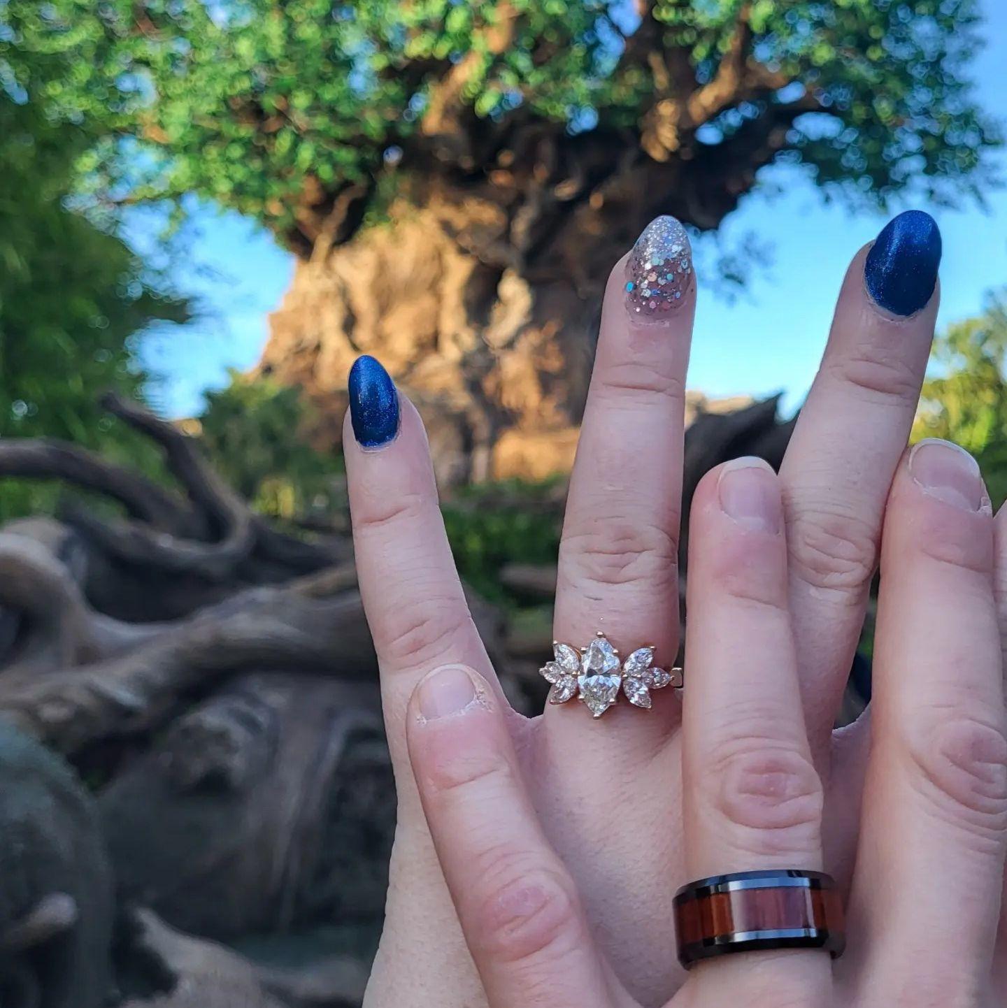 After Richard proposed to Amber at Harry Potter World in front of Hogwarts castle, Amber surprised Richard by proposing back to him in front of the Tree of Life at Walt Disney World!