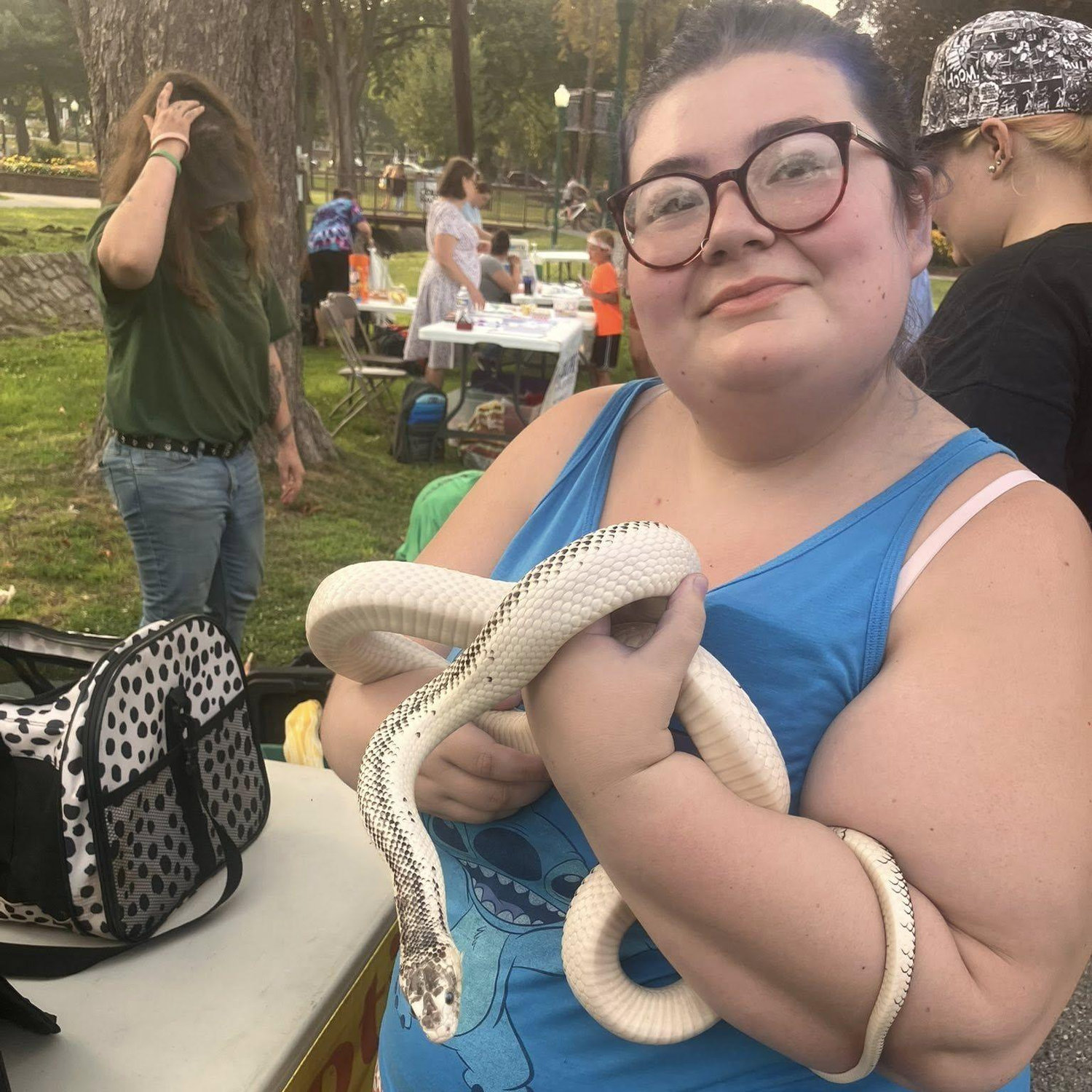 zoe holding a snake