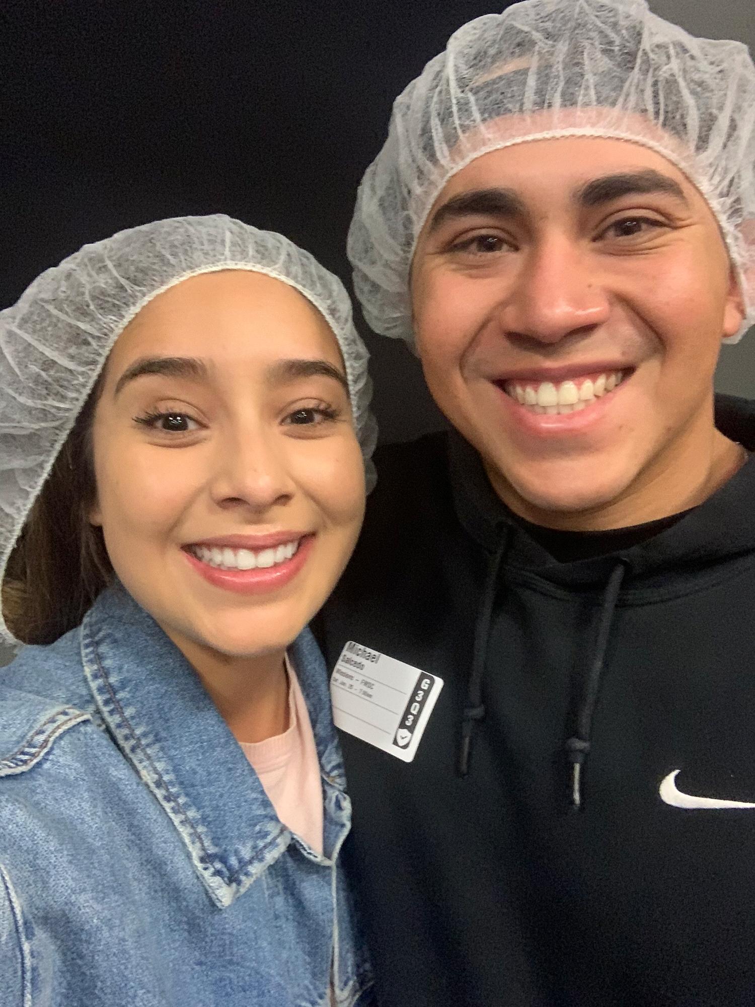 A couple who serves together, stays together. Feed My Starving Children food drive.