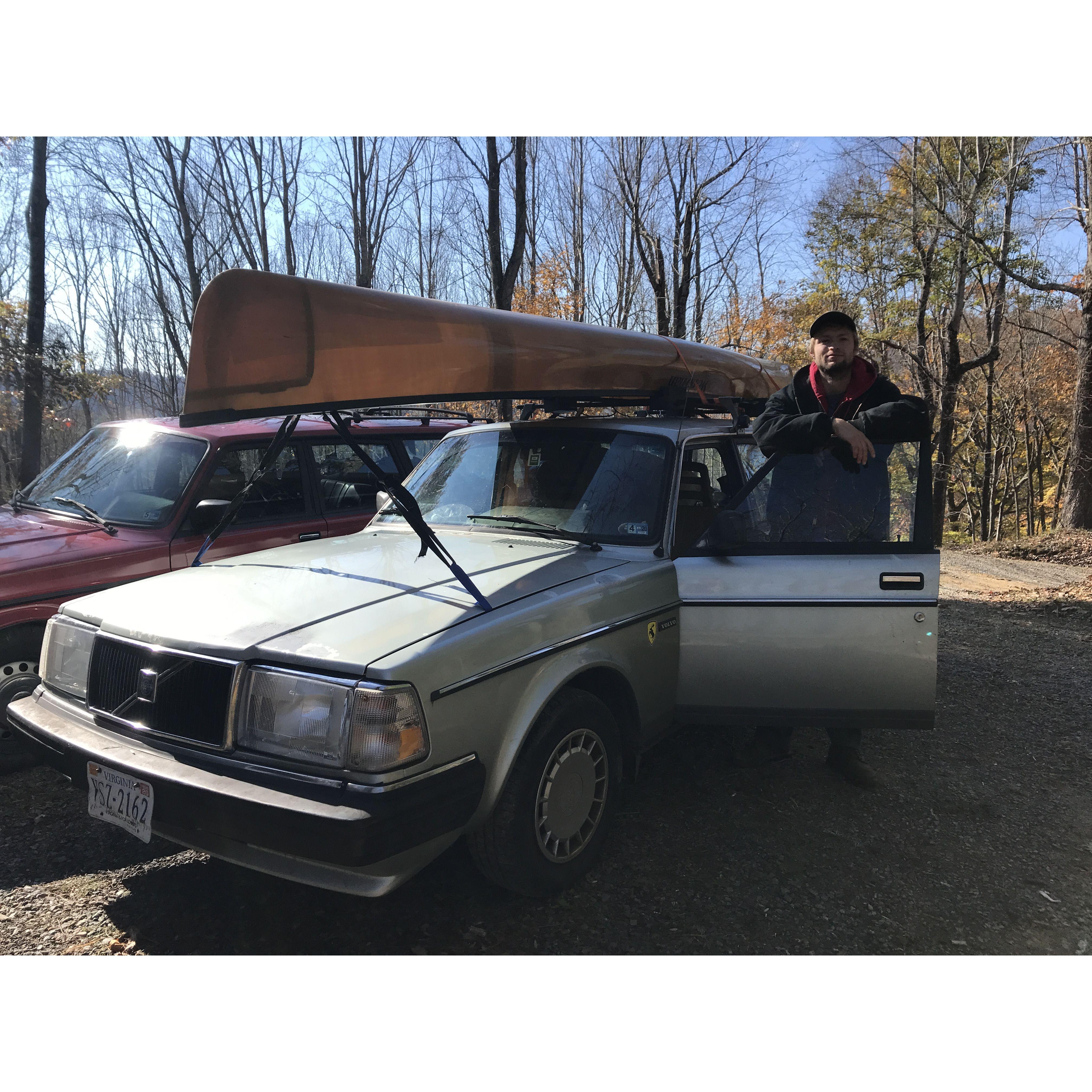 Two of Nathan's favorite things: volvos and canoes.