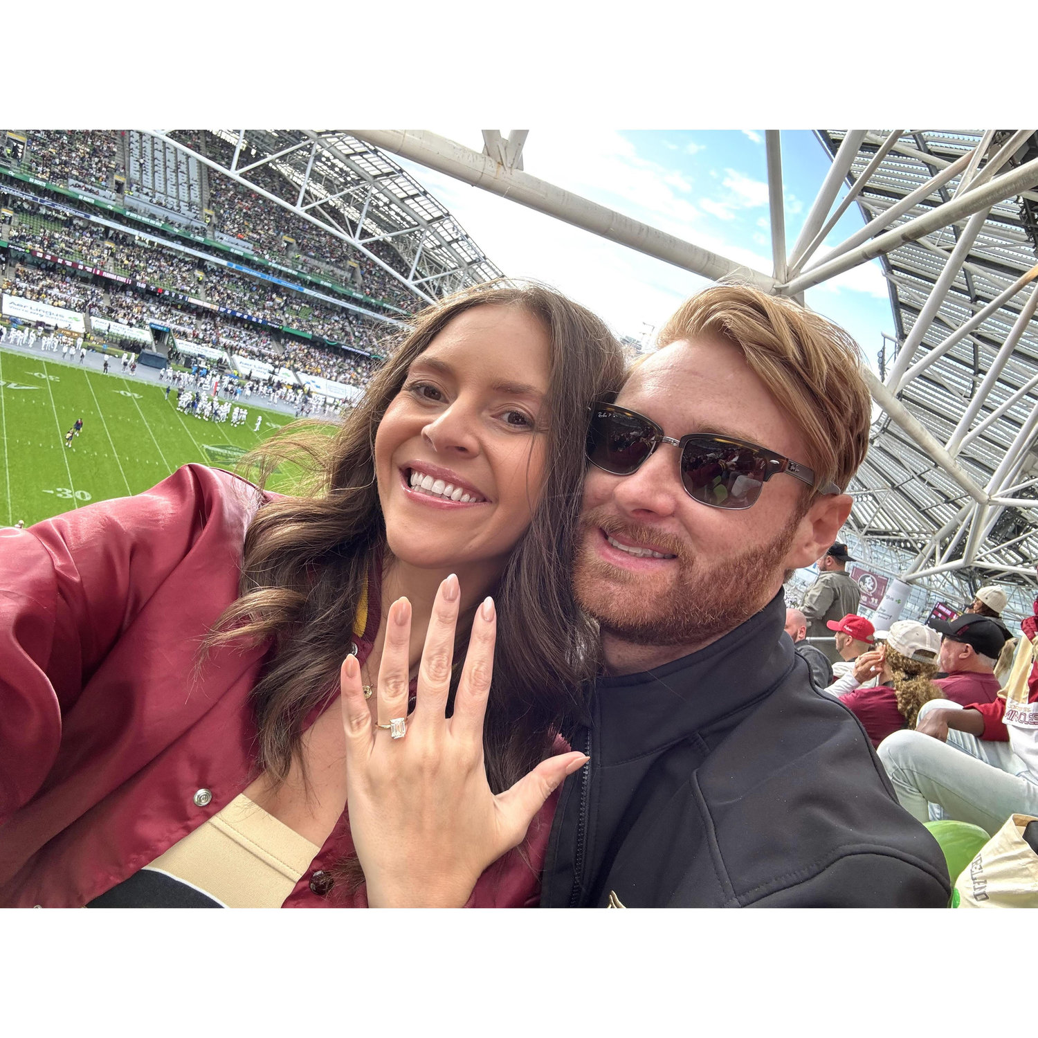 Celebrating our engagement watching FSU play in Ireland!