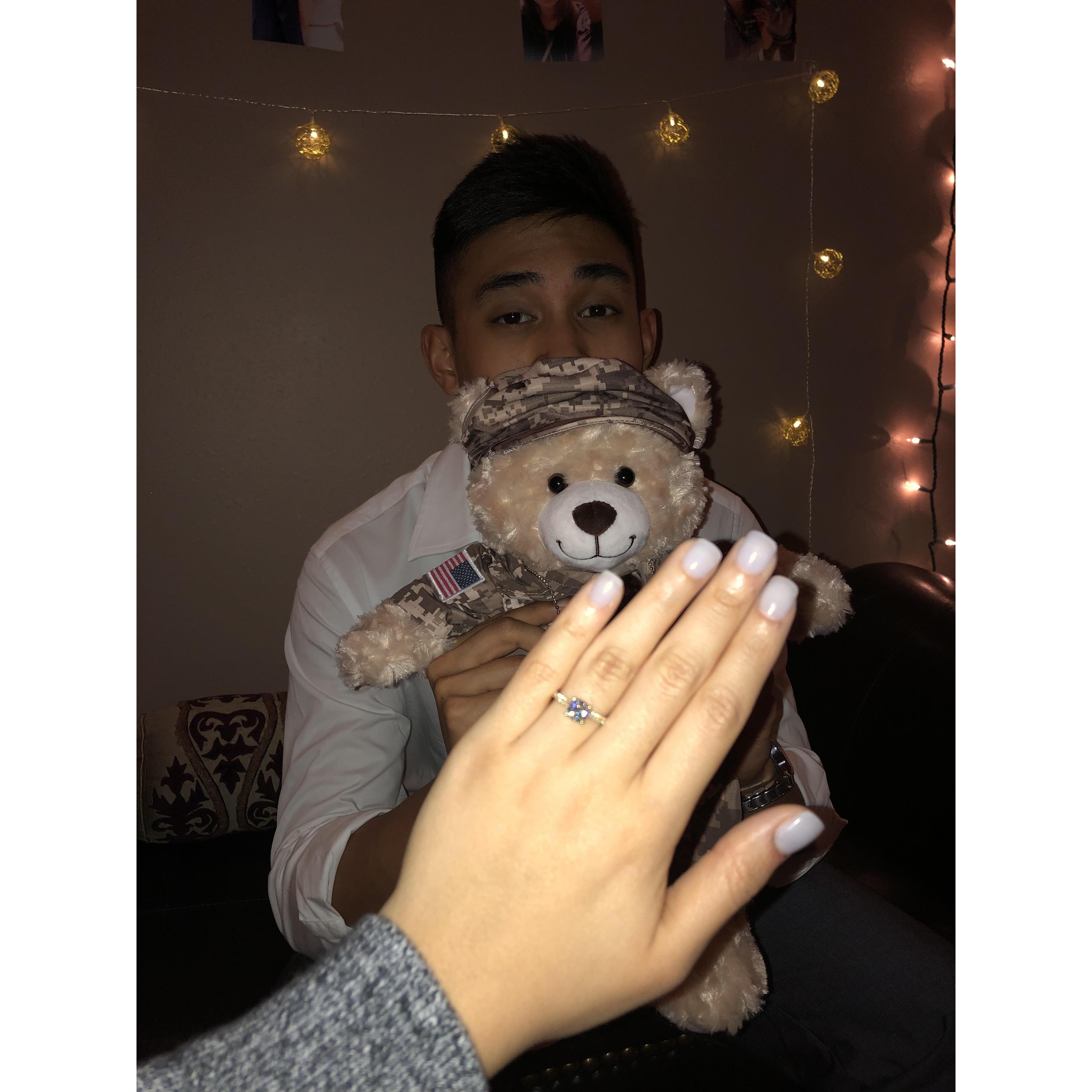 He proposed and I said YES! He is holding a bear that he made for me and recorded a message, made me tear up!