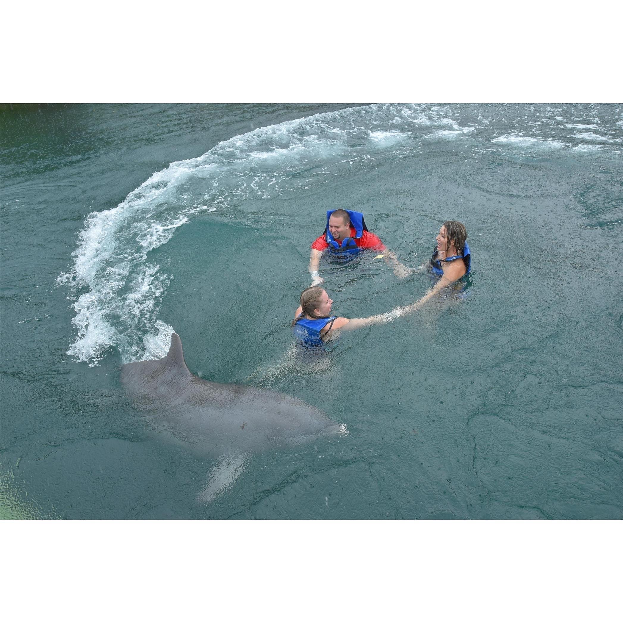 This is with one of Melissas bridesmaids, my groomsman Eddie was supposed to join but was scared the dolphin may pull him under and drown him