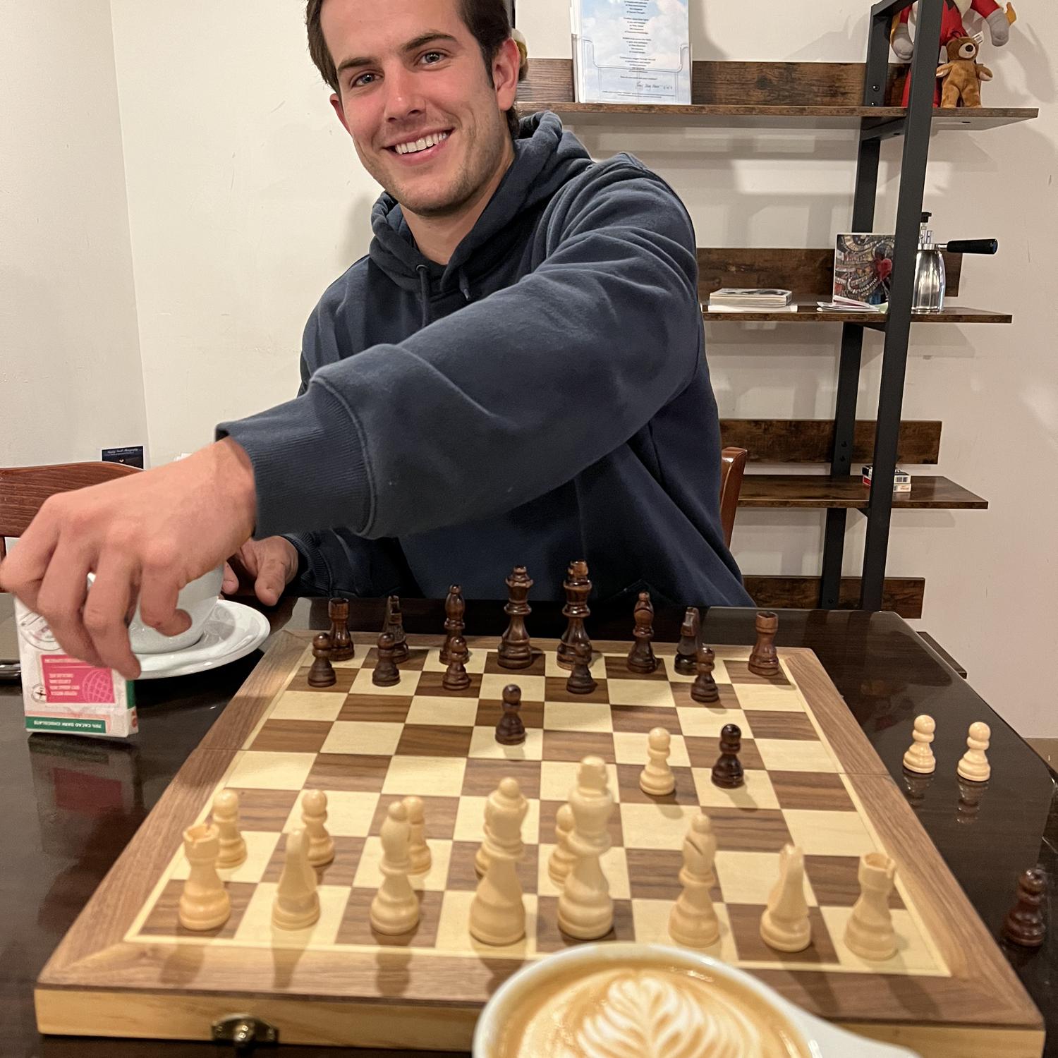 Our first time playing chess together. Sam and I have spent many early mornings playing cards, chess, or reading together.