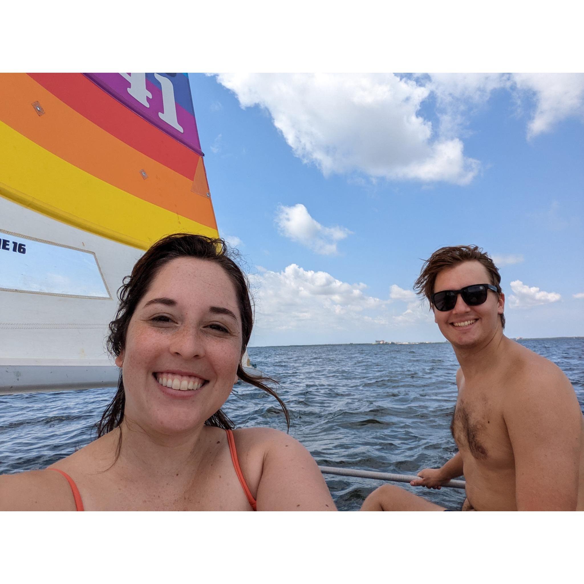 Out sailing on Kasey's Hobie 16. That day they lost a shoe, a hat, sunglasses, 1 emergency oar, and a bit of Kasey's pride.