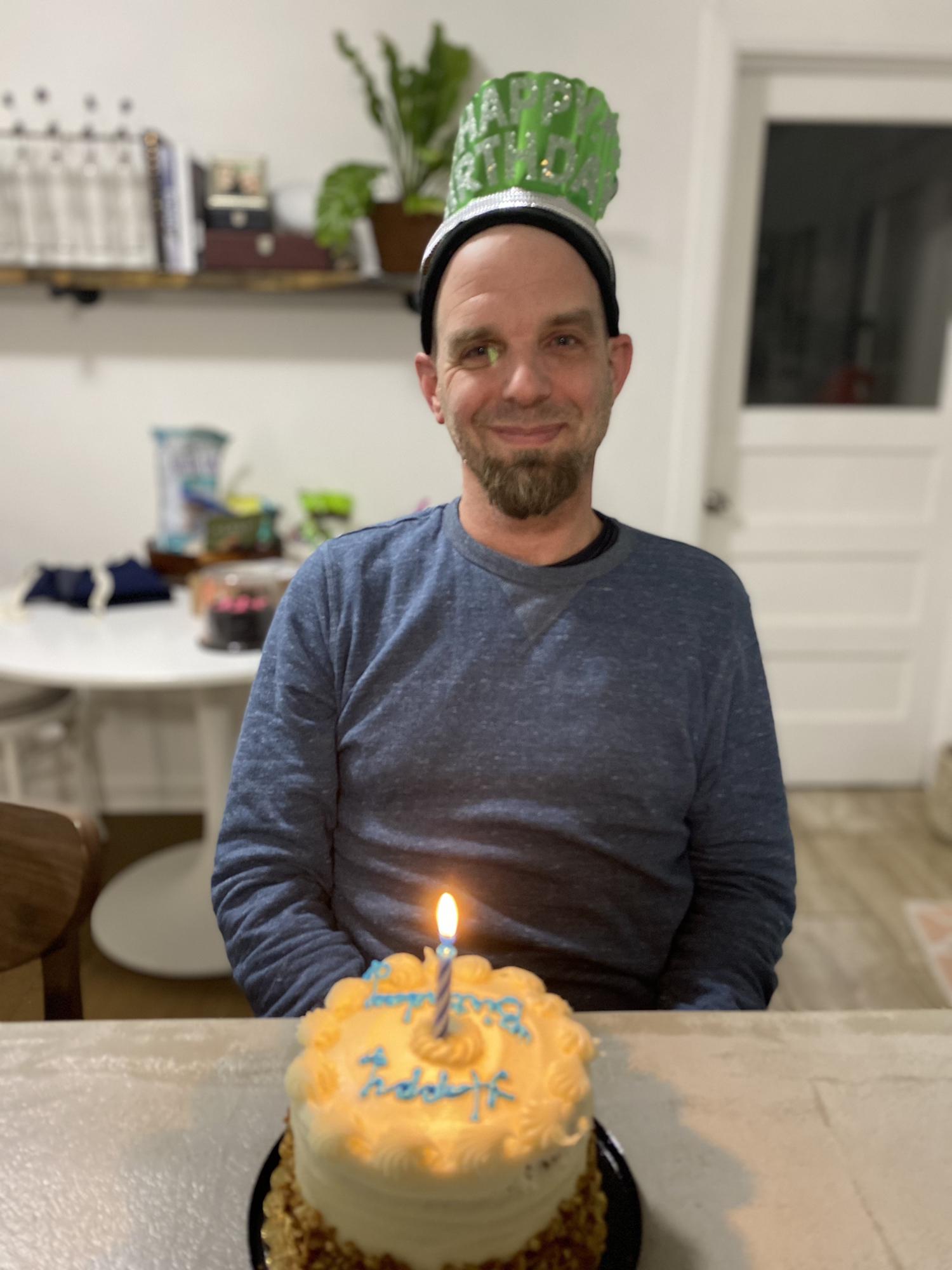 Jason's Birthday - Elizabeth made him put on that hat and smile for the camera.