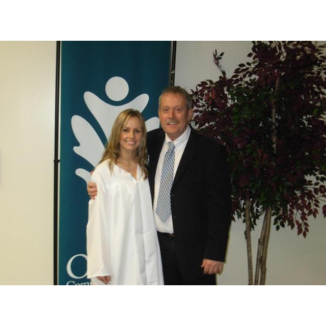 Jill and her dad at her graduation from nursing school.