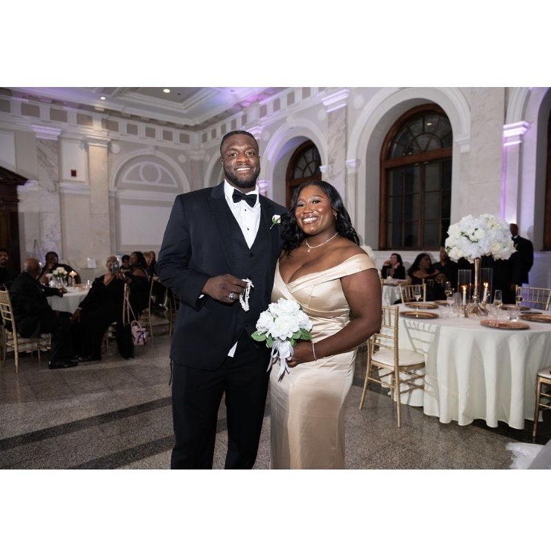 Macy caught the bouquet and boutonniere at Brandon's sister's wedding.