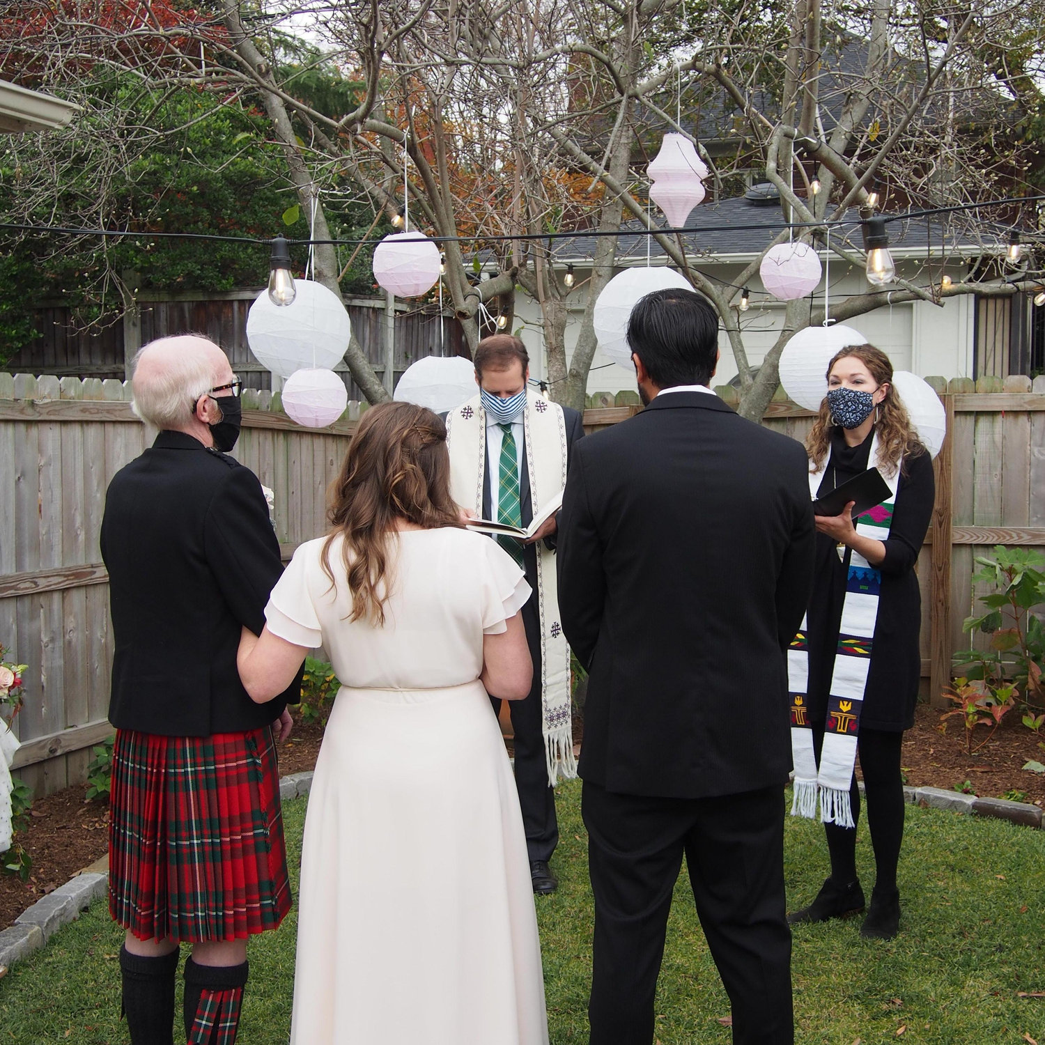 The Reverends Davis and Julie Bailey officiated the Christian backyard ceremony