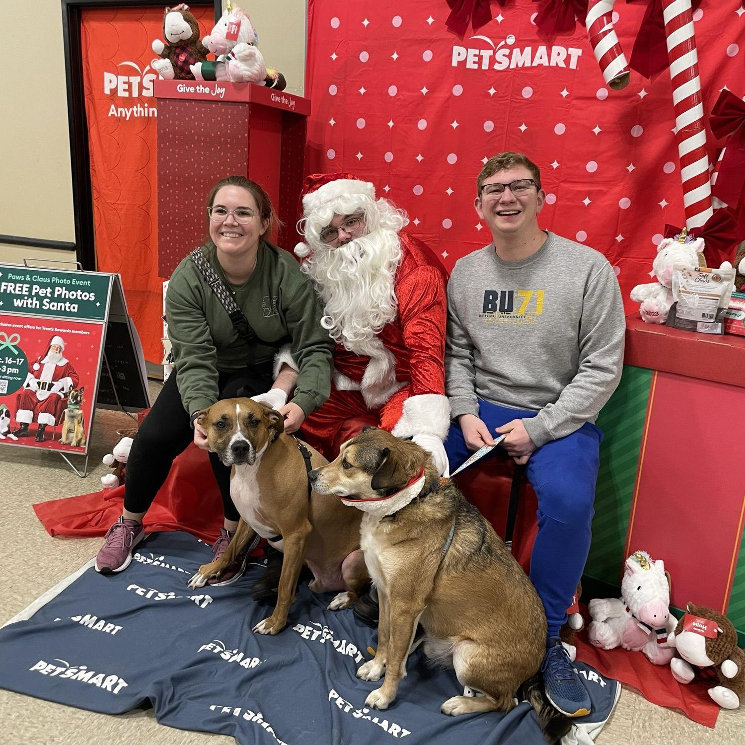 Noah was NOT a fan of Santa, and Lincoln could not have cared less about looking at the camera lady.