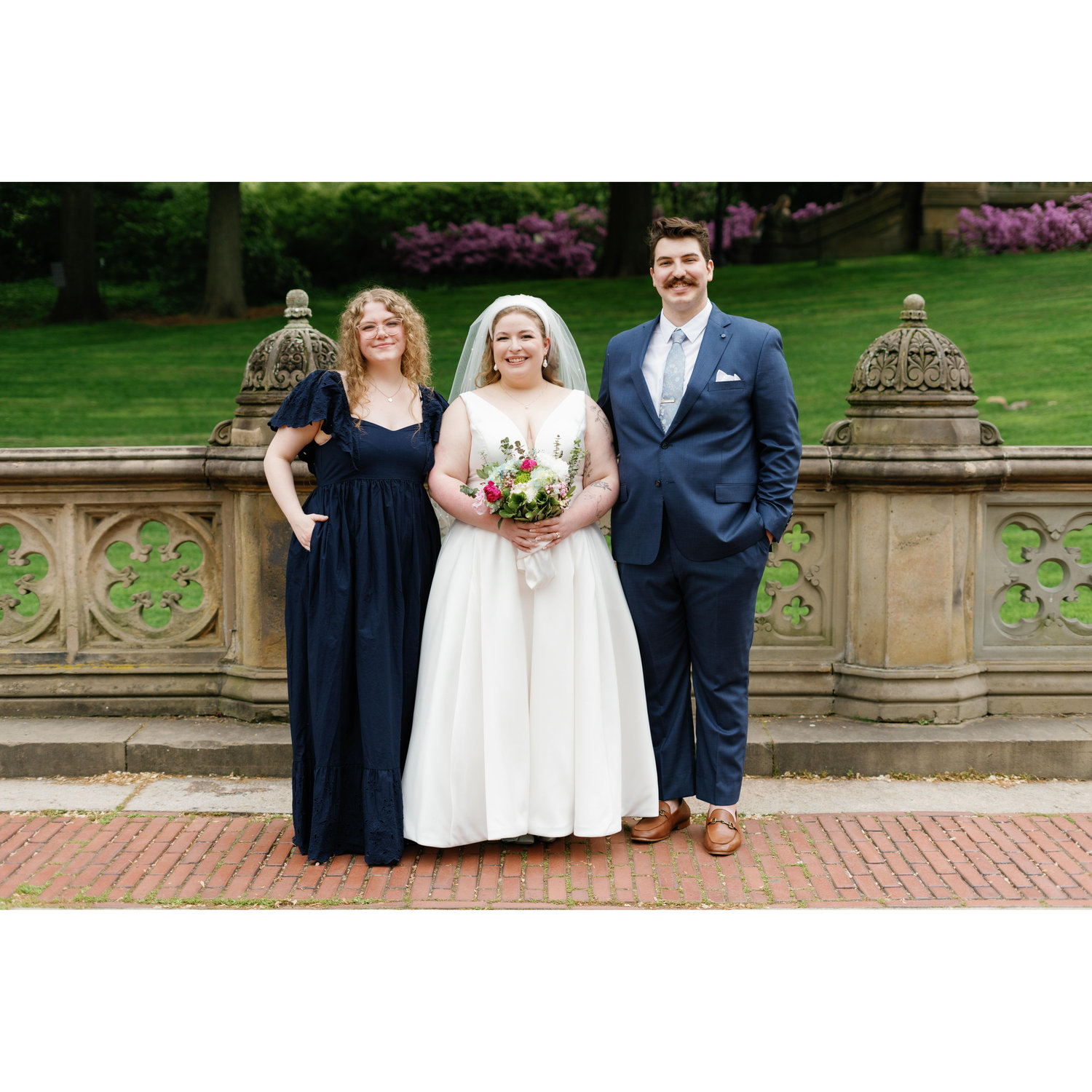 Officiant of the Ceremony with the Bride and Groom