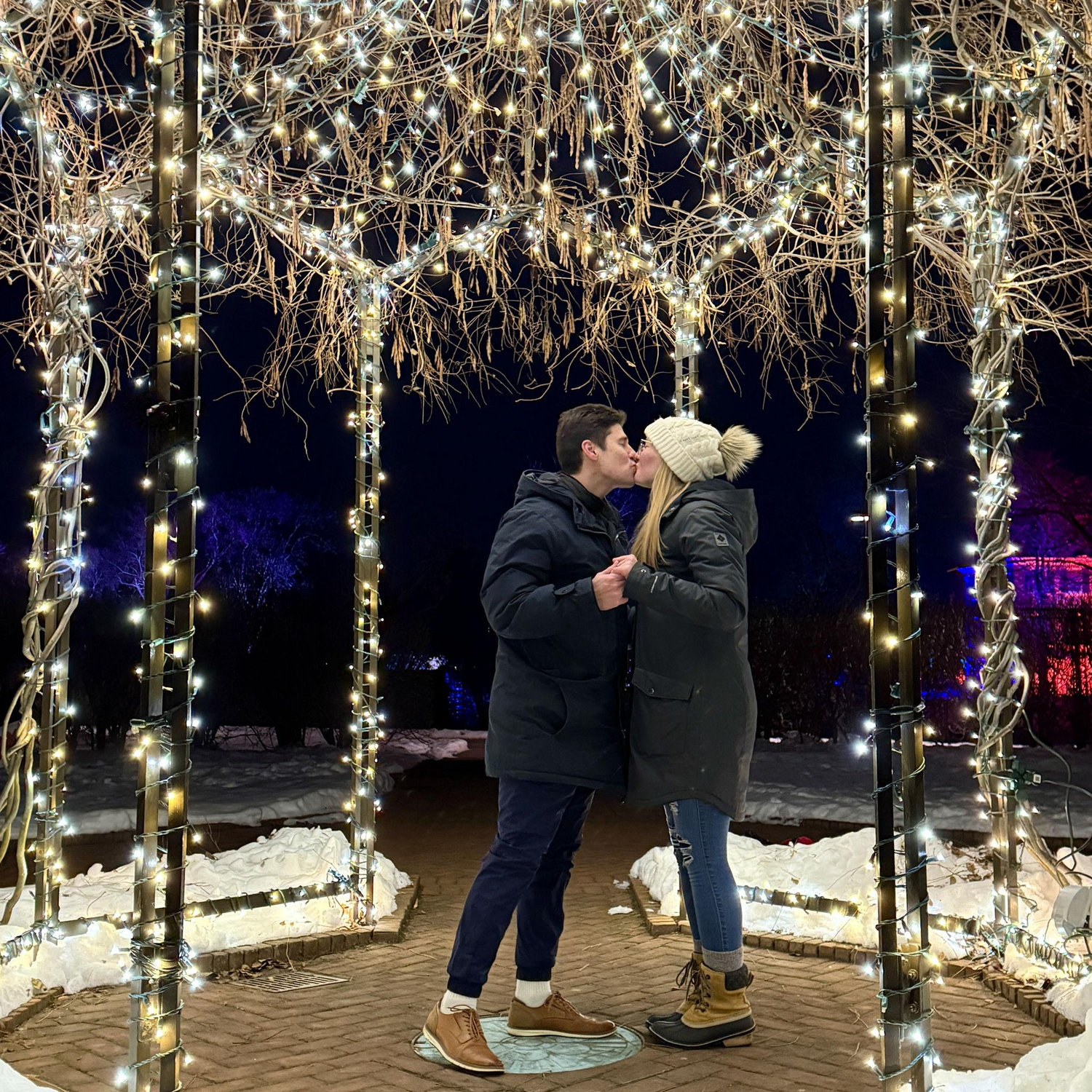 Big ol' kiss before Megan turned around to find her parents (from 4 hours away) and Ben's parents were behind her to witness the whole thing!!