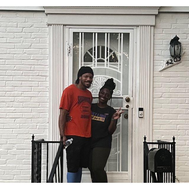 Our first picture together in front of our house