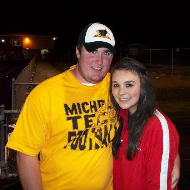 Our first picture together, before we even started dating. Kyle came back for Homestead's Homecoming game.