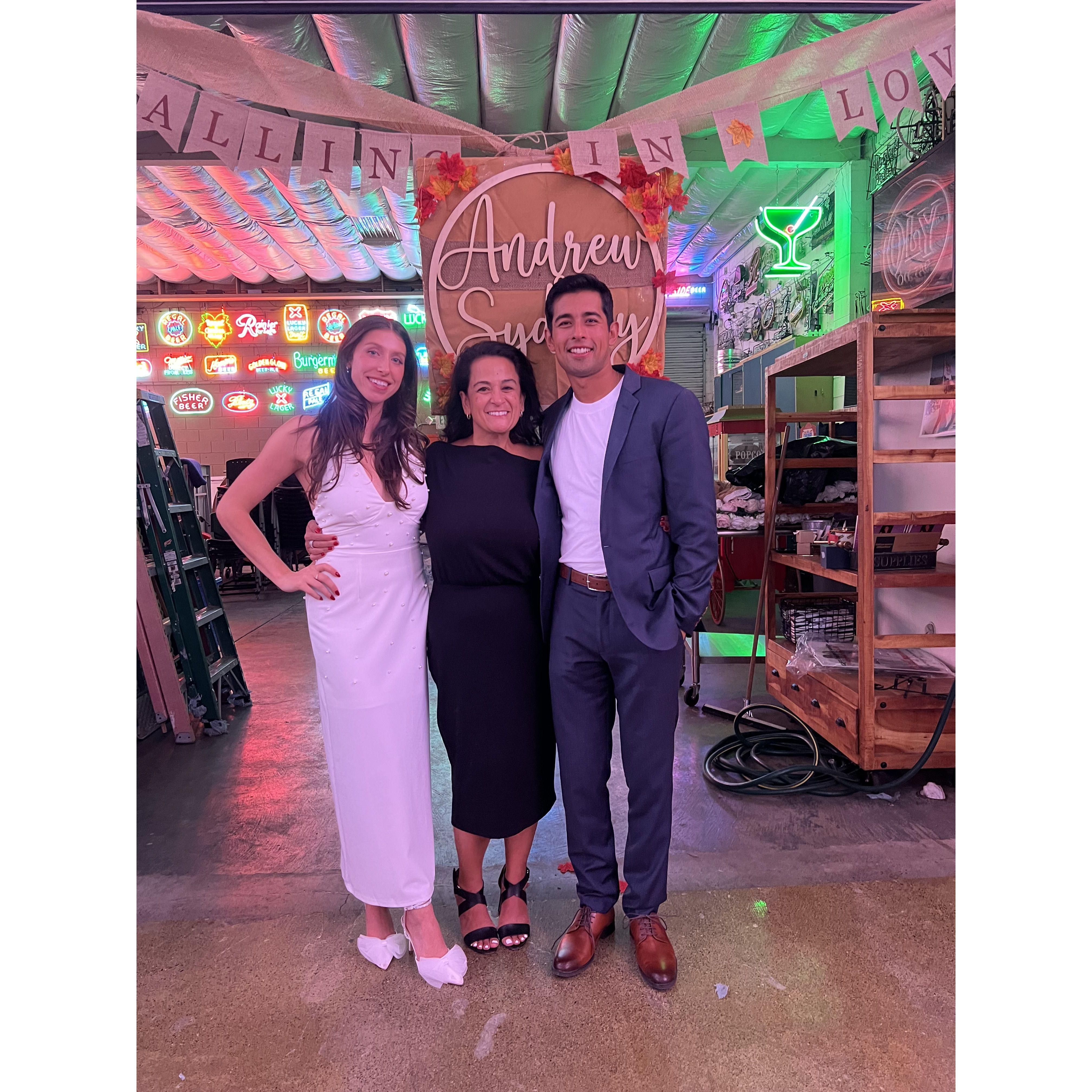 Us with the Mother of the Groom, Evelyn at our engagement party November 2024
