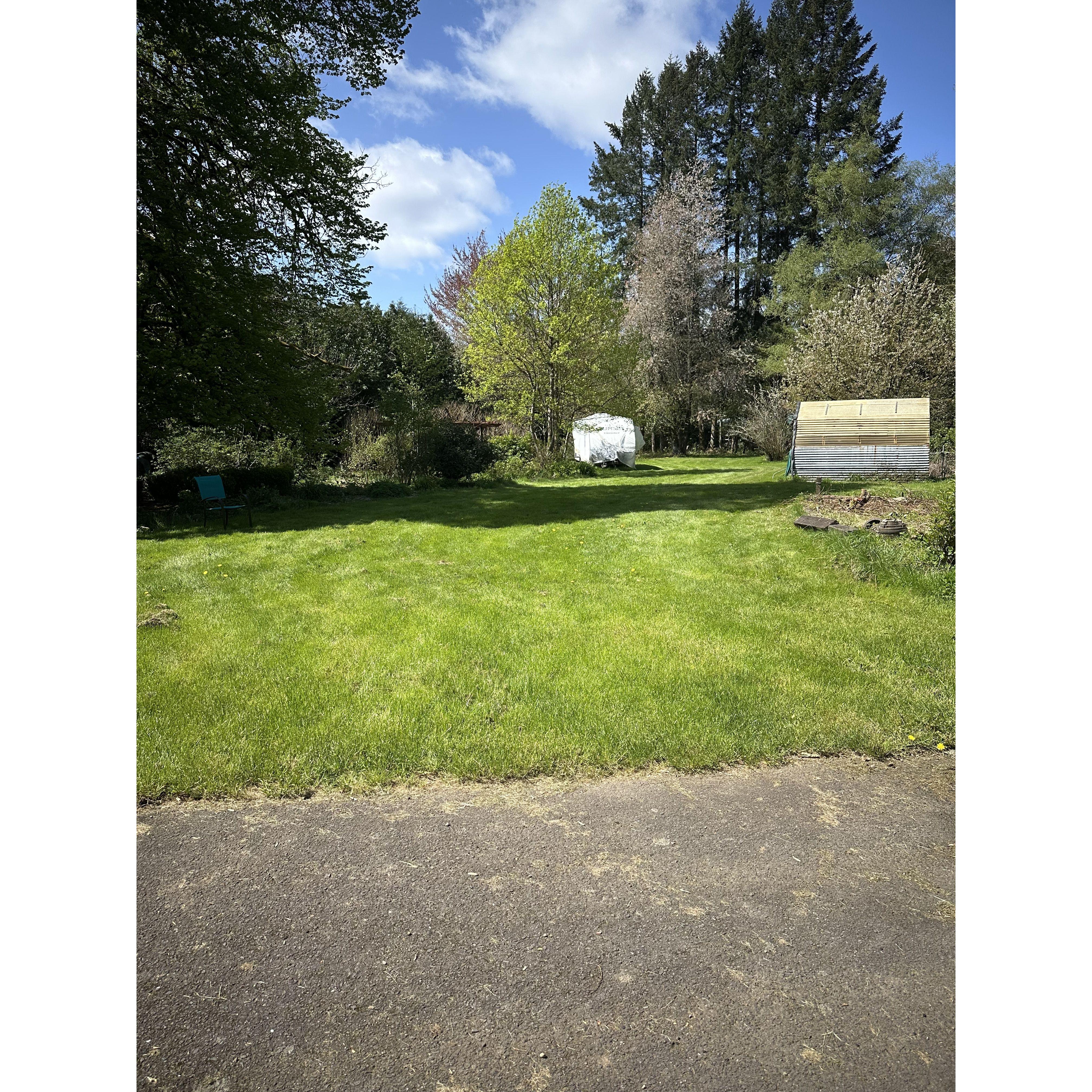 A small section of this part of the field will be dedicated to parking, we can fit approximately 12 cars in this area.