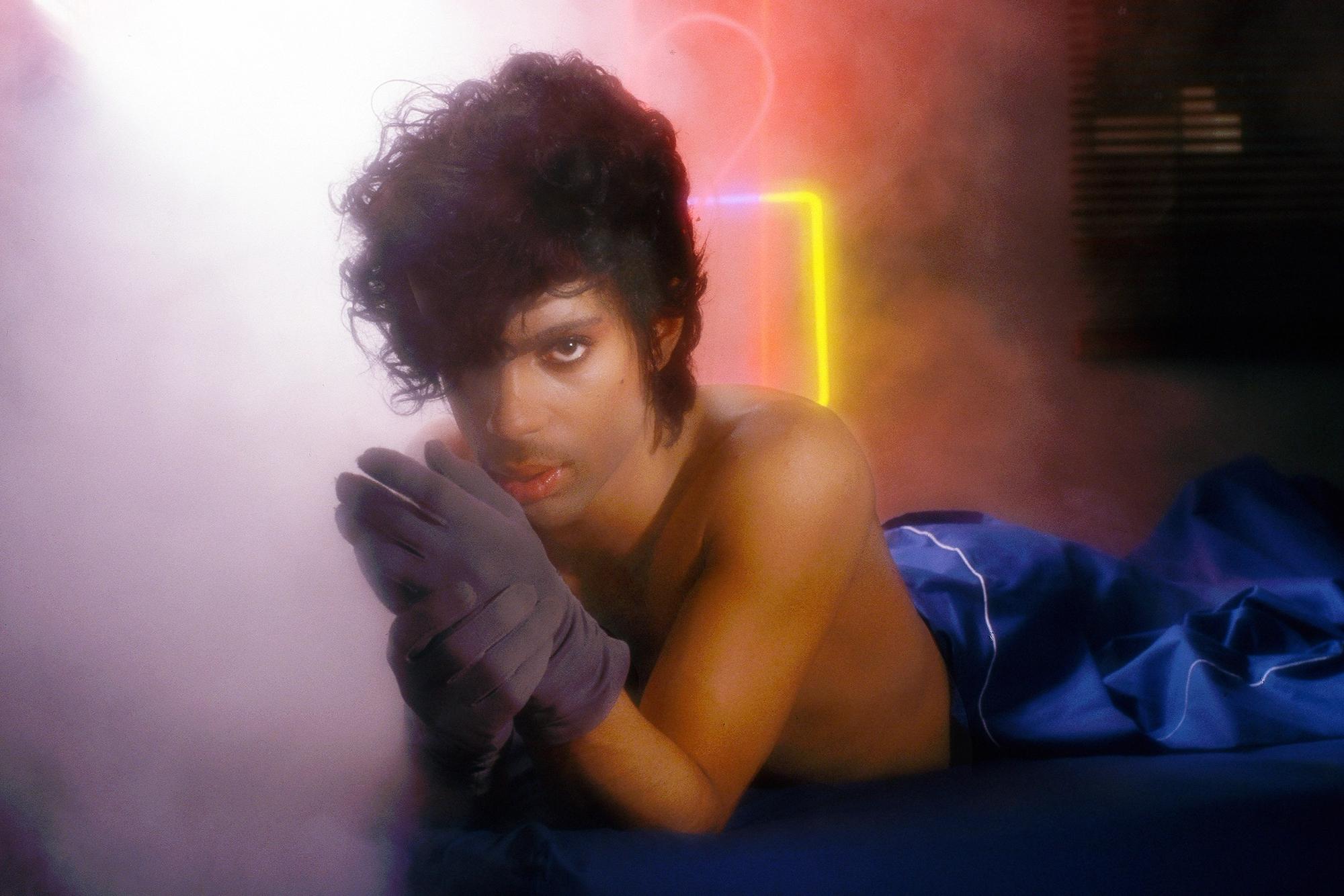 “Dig if you will a picture of you and I engaged in a kiss” Prince