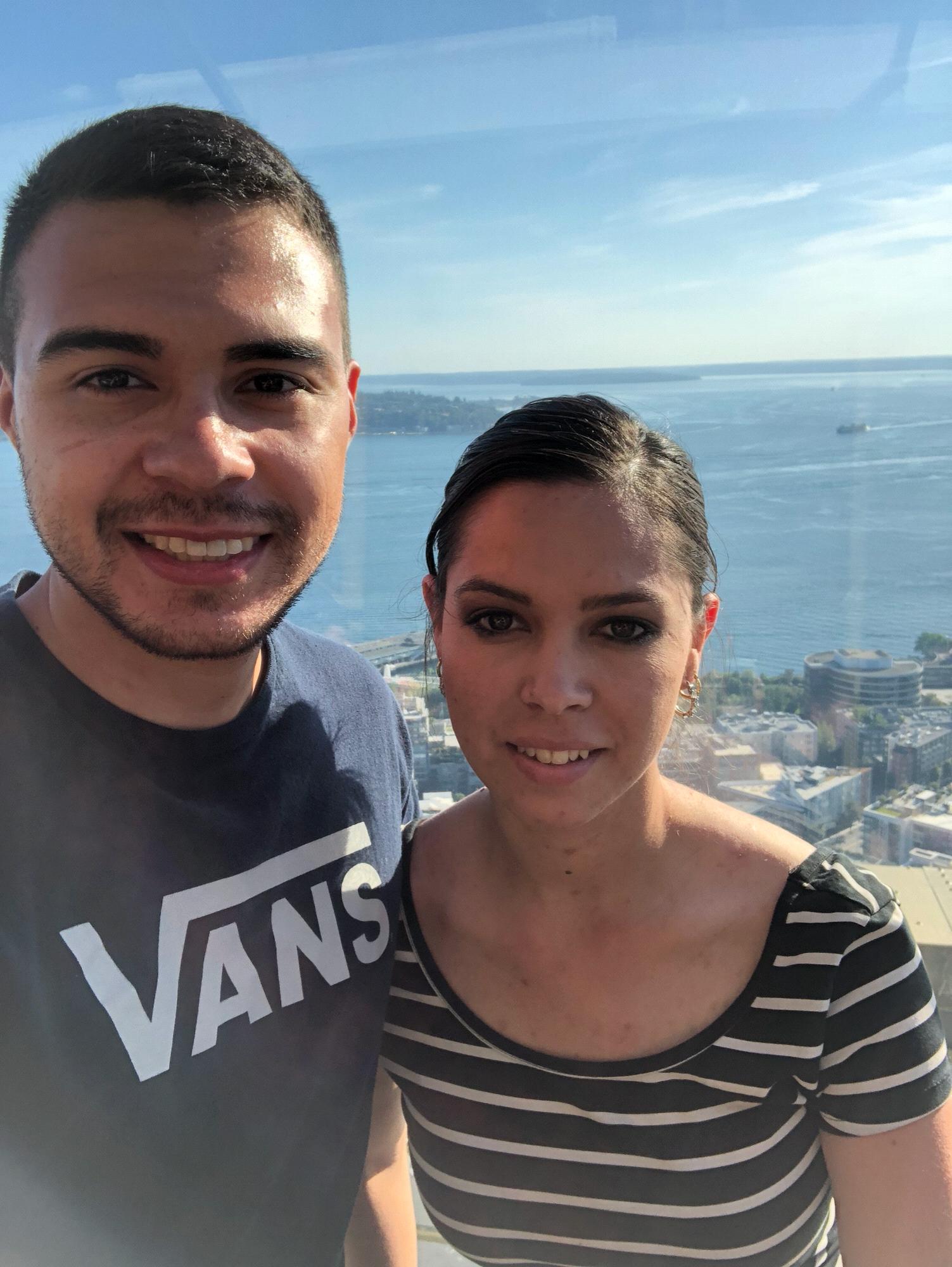 This photo was take with our backs on glass at the top if the Seattle Space Needle.