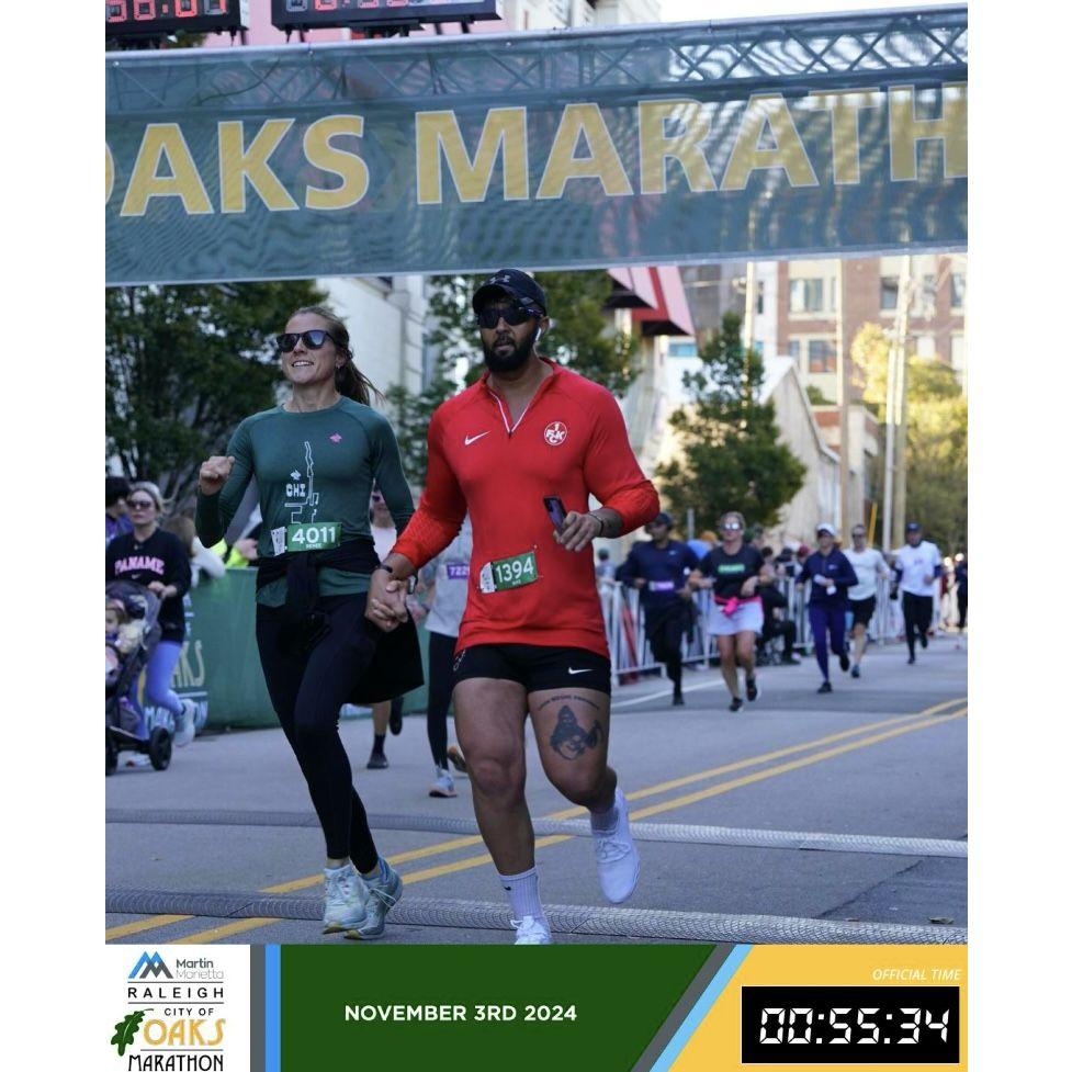 The finish line of our first half marathon run together. Finished like we started. holding hands and supporting each other, early and often, and when it matters most!