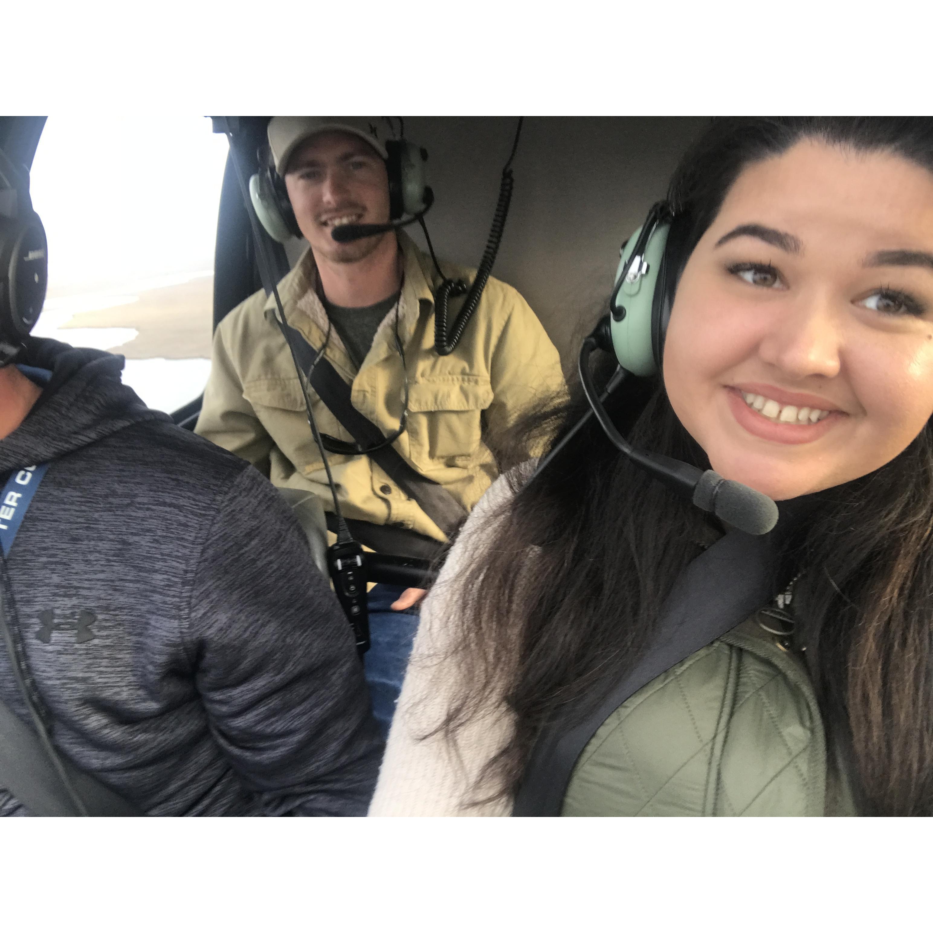 Kasey & Christie fly over Savannah, Georgia in a helicopter. Circa 2019
