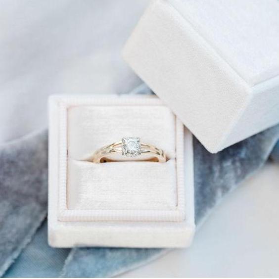 This is Mike's grandmother Doris' ring. He presented this to Allie when he "popped the question" and it fits perfectly!