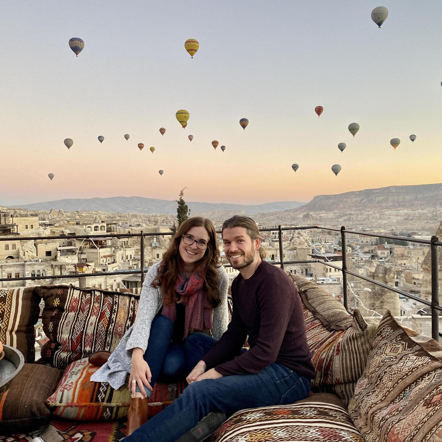Watching the sunrise with hundreds of hot air balloons in Turkey. We went up in one the day before!