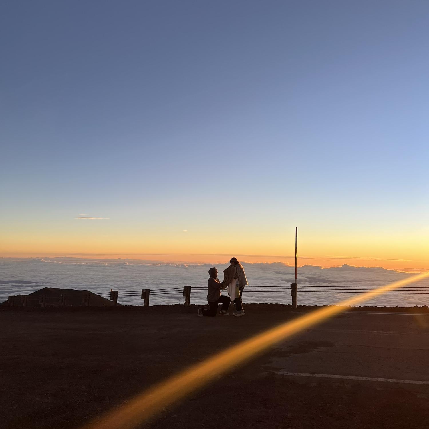 John proposed in December 2025 on  a sunrise trip up to Mauna Kea on Big Island, Hawaii