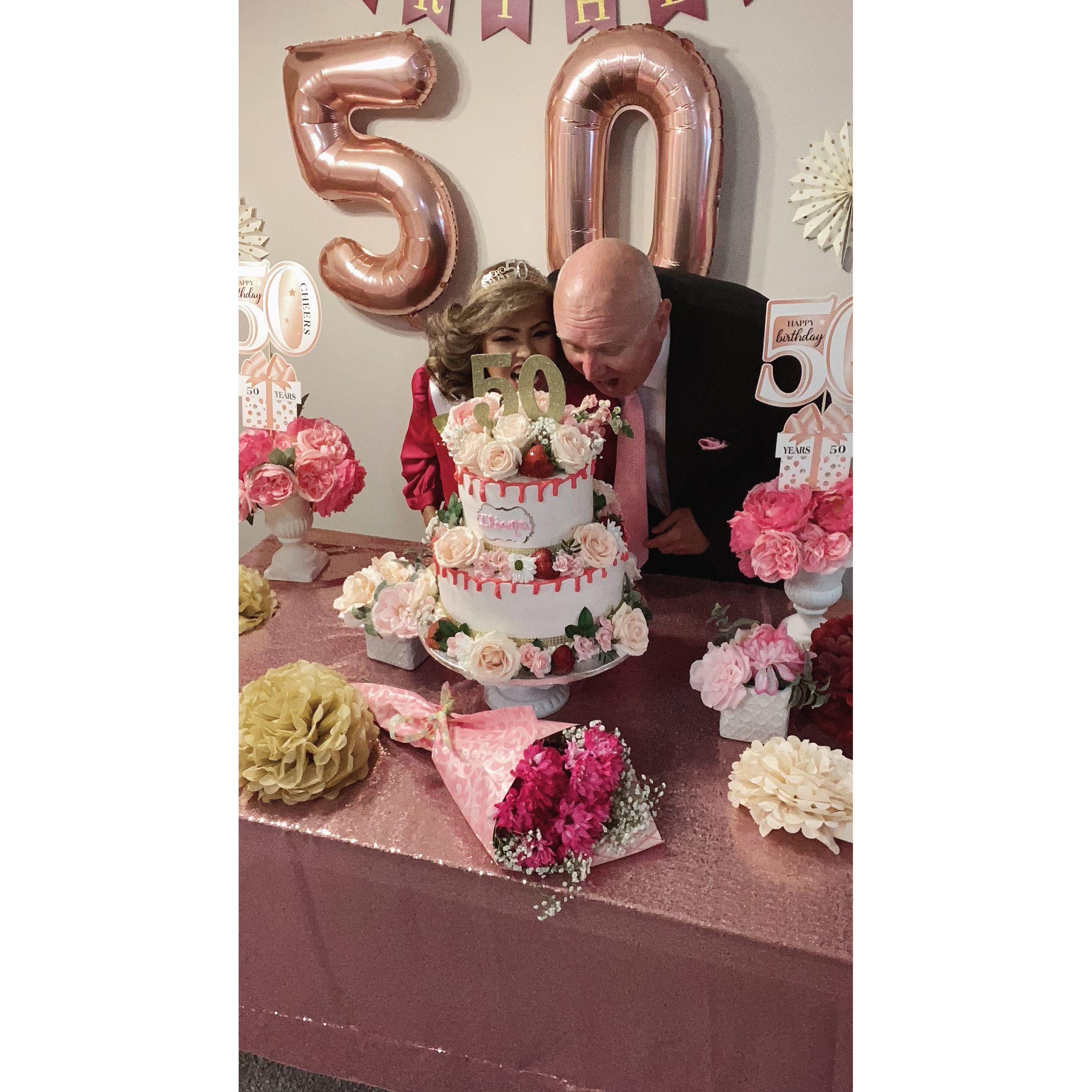 Digging into birthday cake.