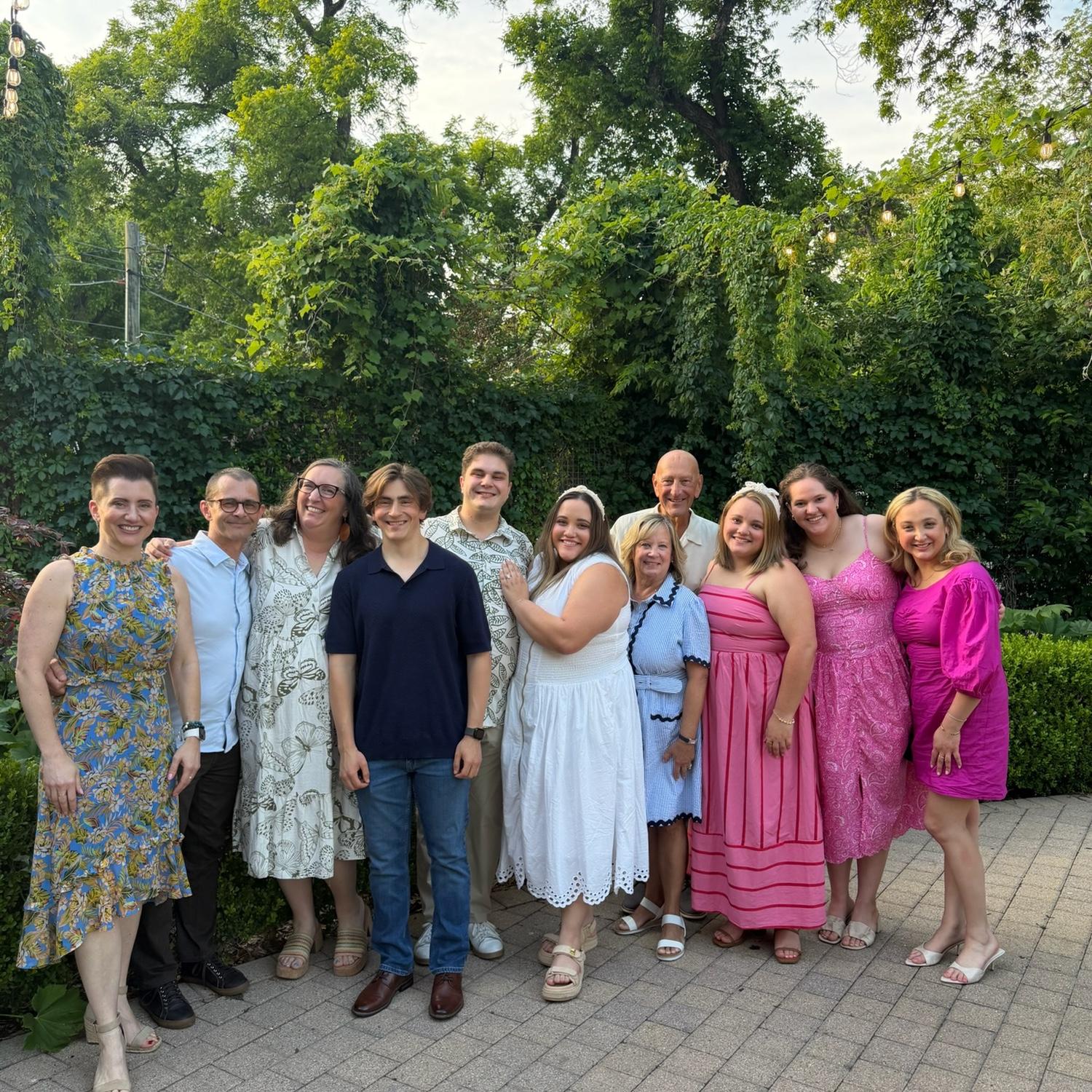 Photo taken from Caitlyn and Jaxon’s engagement celebration featuring both of their families!
