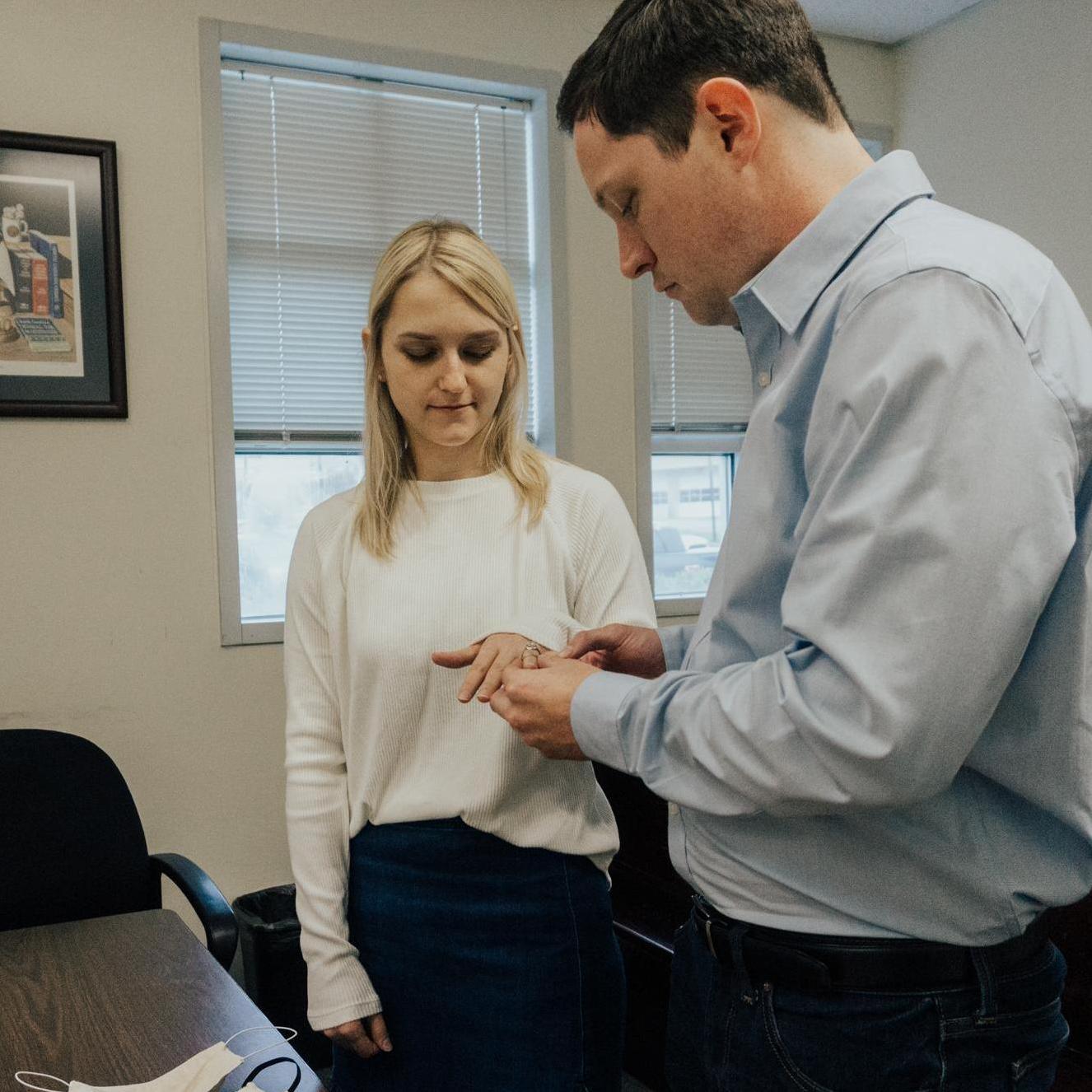 Exchanging our wedding bands.