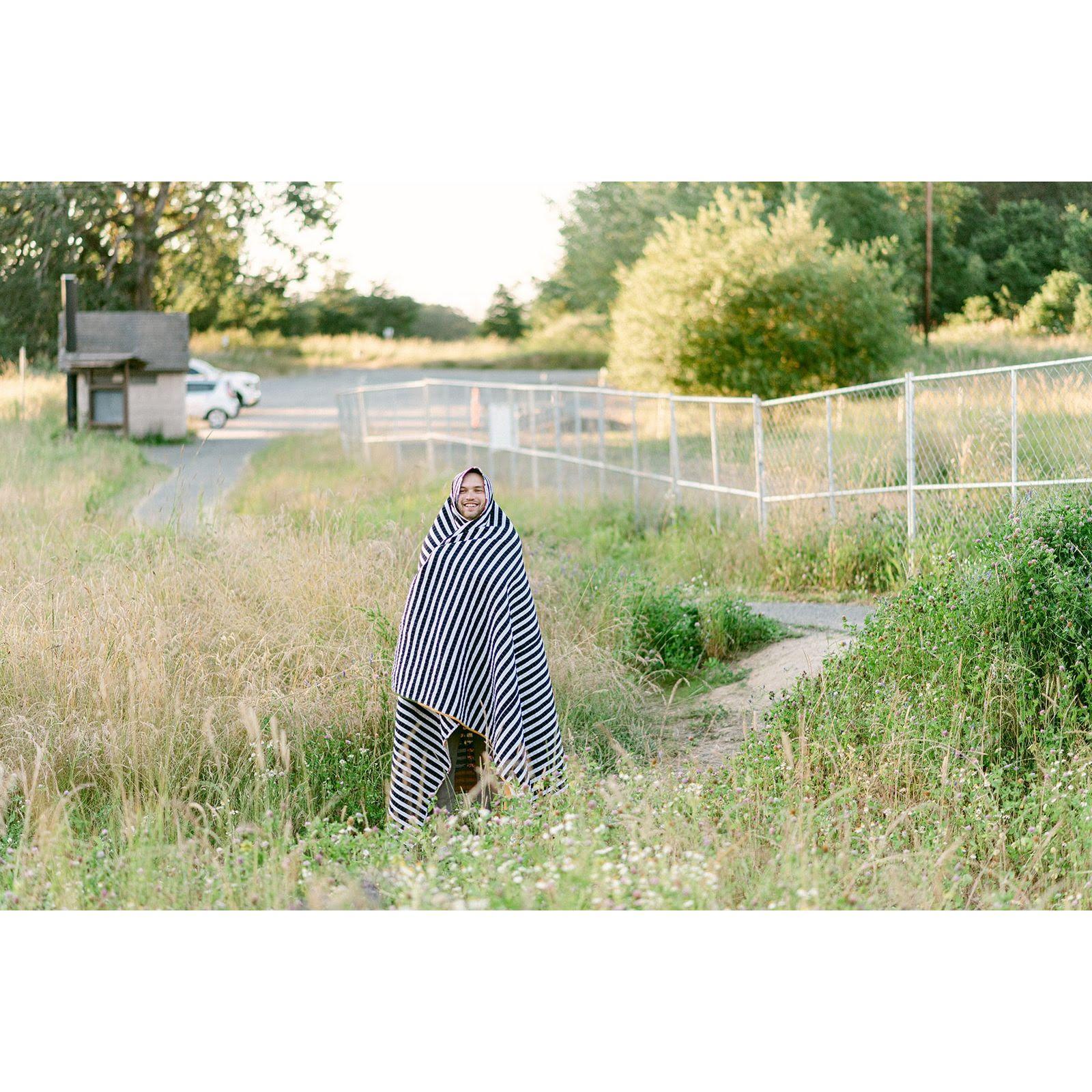 Spencer trying to save himself from the mosquitos the evening we took our engagement pictures!