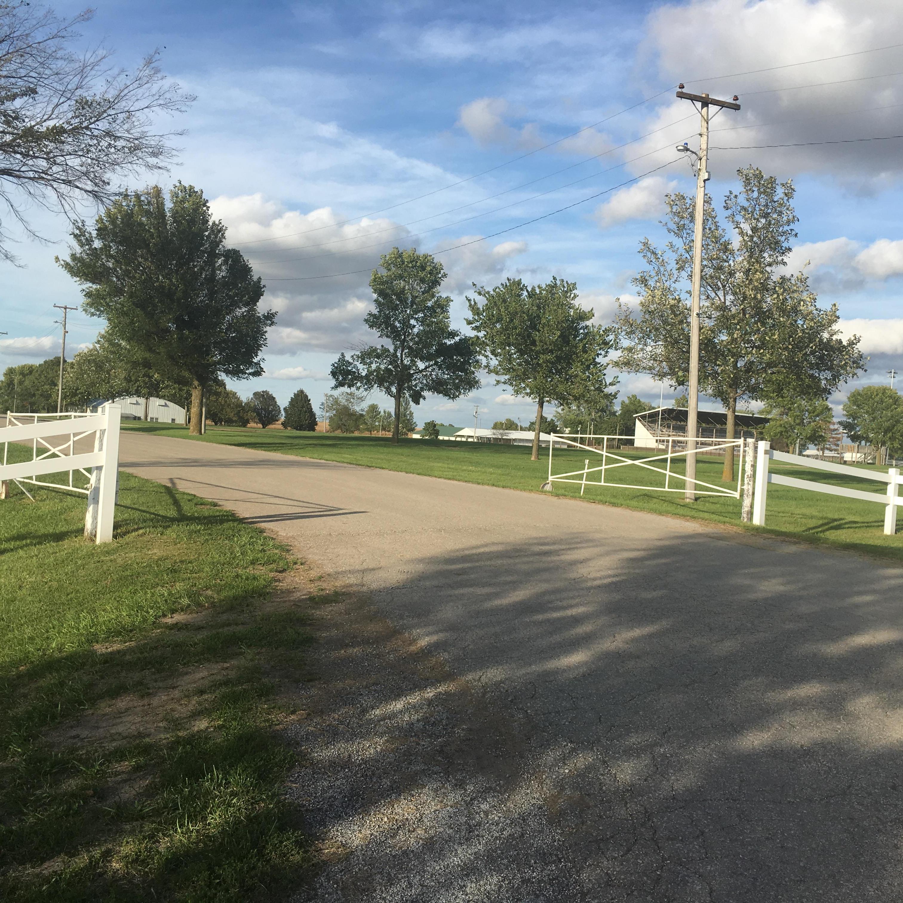 When you get to the Fairgrounds Sign, take the road to the left.