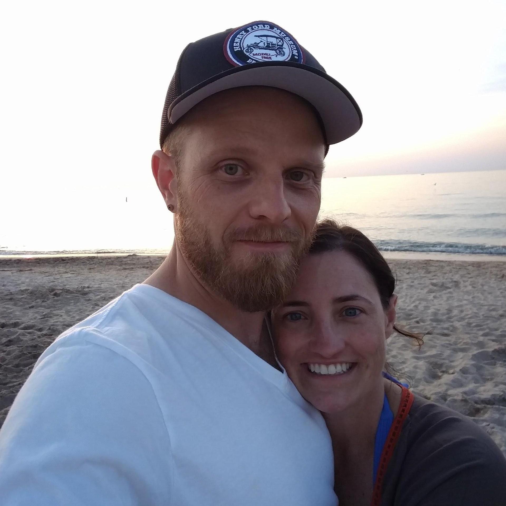 This photo was taken the weekend that Donovan proposed to Anna on the beach in Michigan City, Indiana. Celebration ensued!