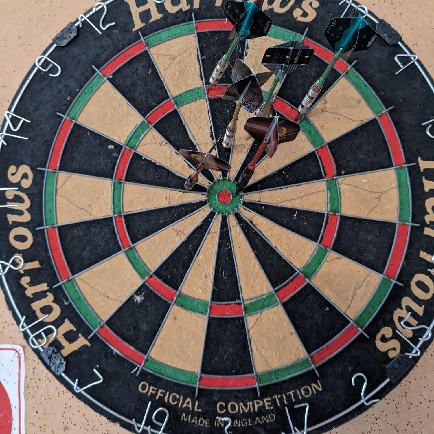 Christian teaching me darts and pool.