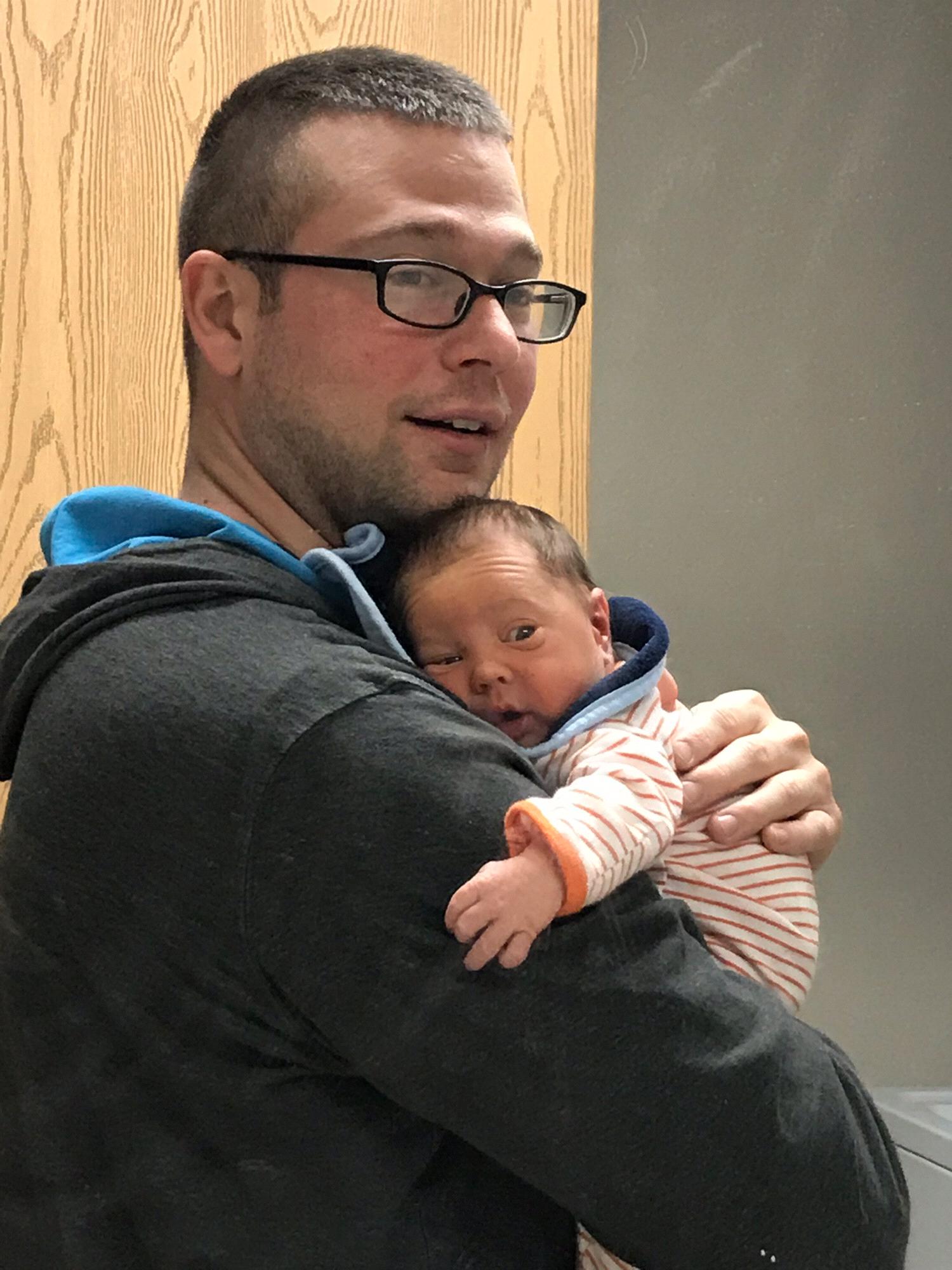 Daddy showed Eli himself in the mirror for the first time.