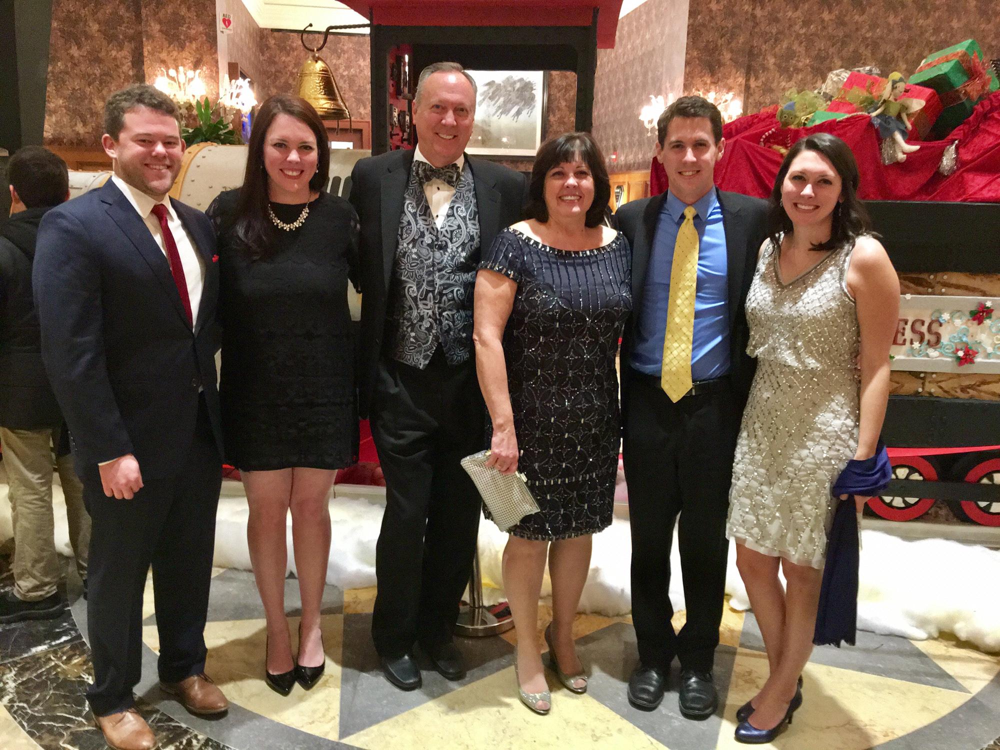 Celebrating the wedding of Sam and Erik at the Royal Park Hotel in Rochester, MI, in December 2016.