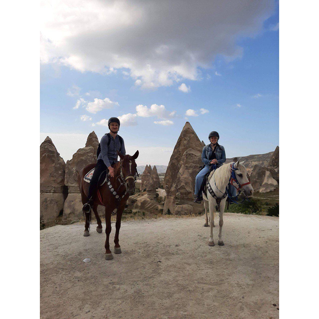 Blair and Nick horseback riding in Cappadocia