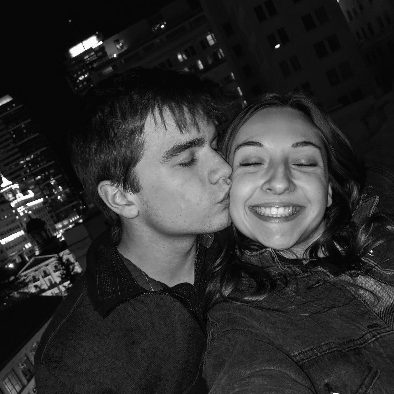 David still kissing Hannah on the cheek even though she just dragged him to a concert knowing he doesn't know the music and doesn't like loud crowded places. He had fun though- January 2020
