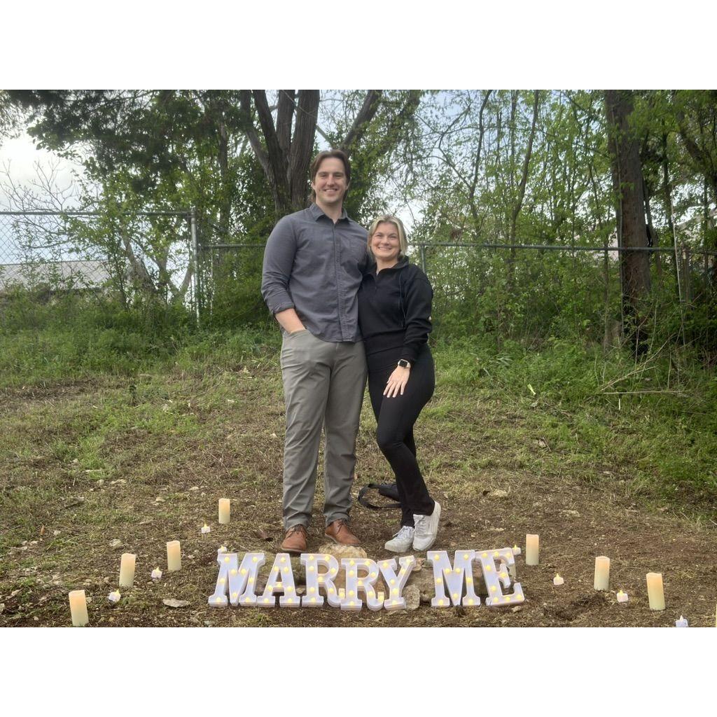 Austin proposed in our new backyard the first week we had access to the house. We have since made our first house into a home for  our Little family of 4 (Jeter and Millie count ok)
