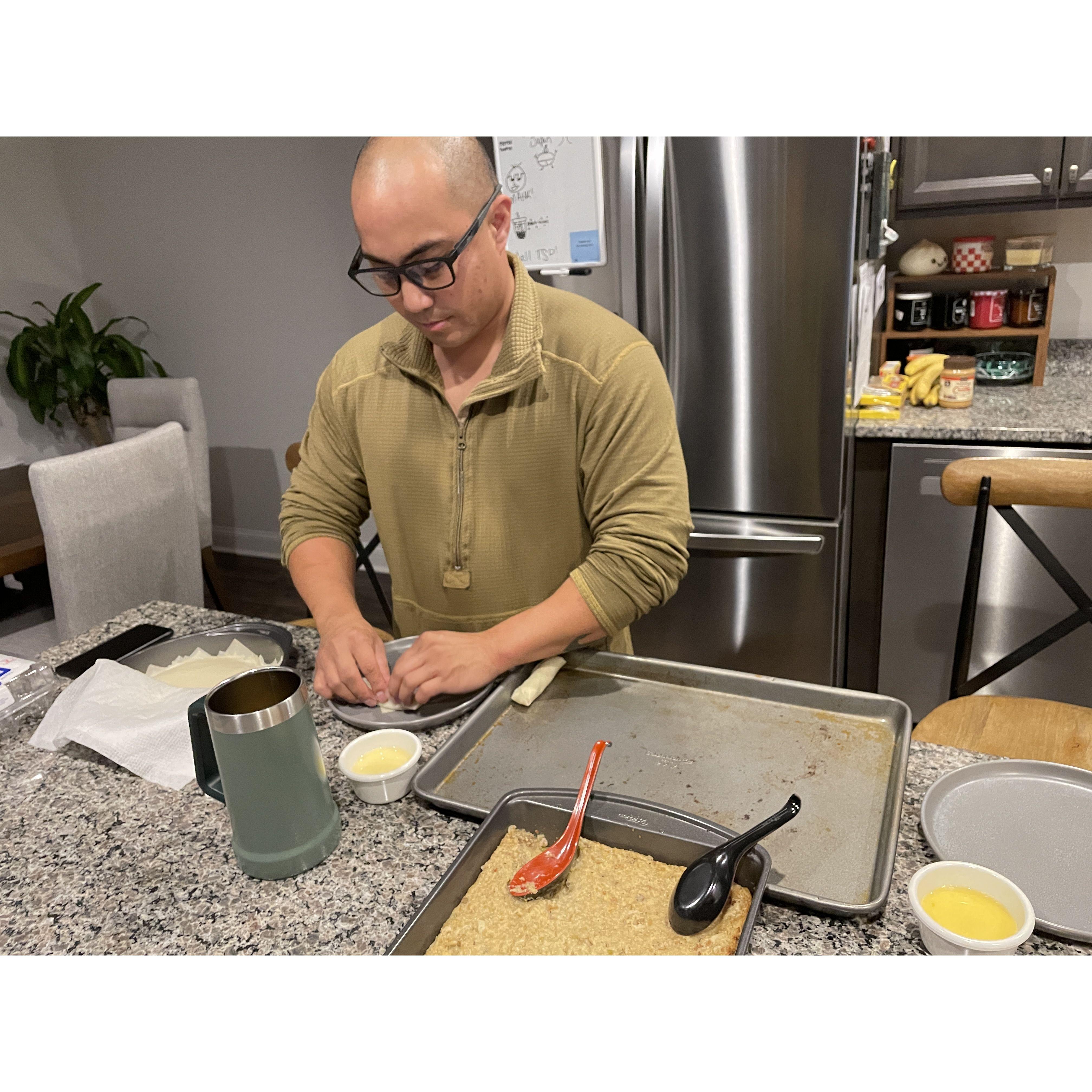 Mark teaching me how to make lumpia!