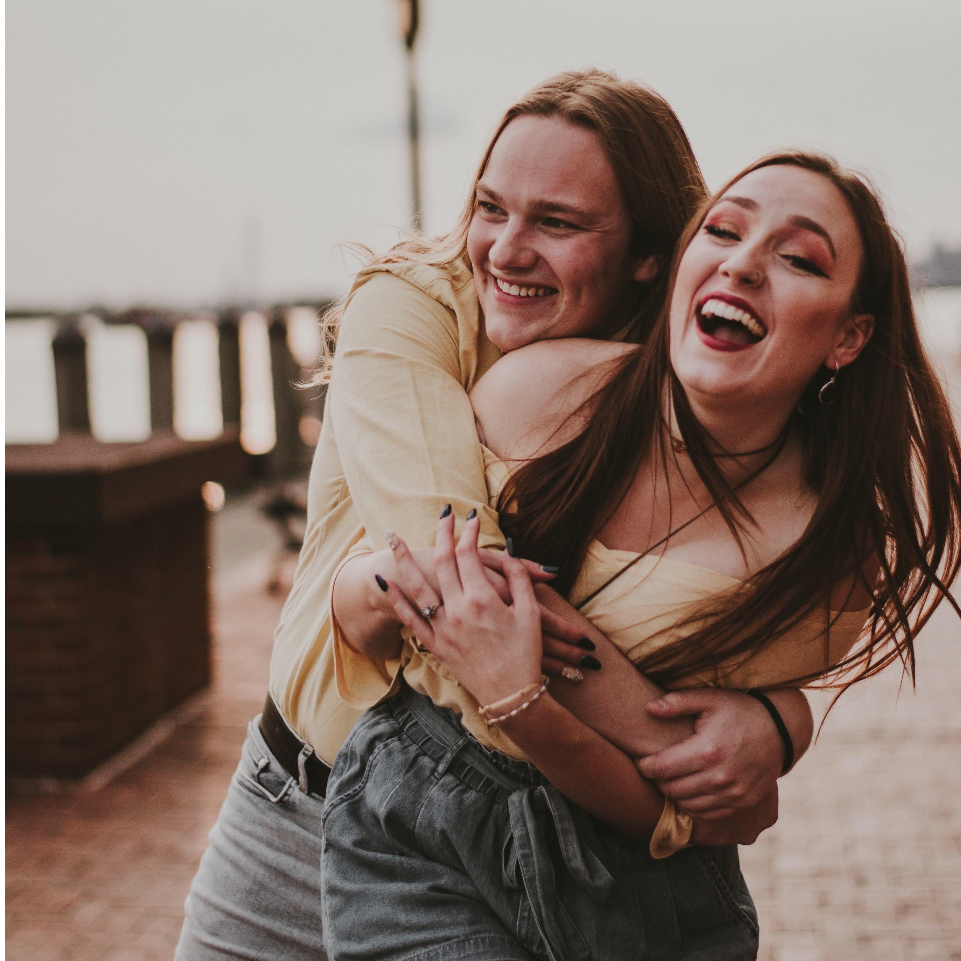 Holly Rice took this amazing photo during our engagement shoot, when Noah surprised me with a hug.