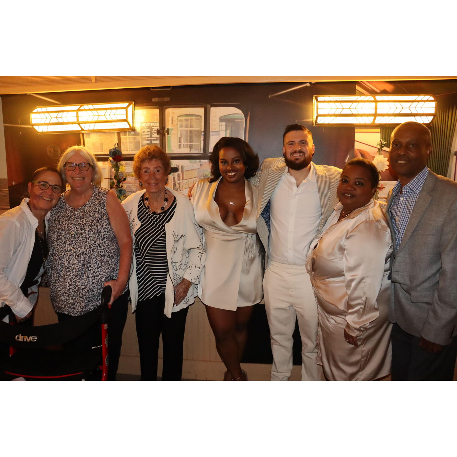 The engaged couple with Allison Lindon and Lisa Fernandez (Dylan's moms), Rhoda Lindon (Dylan's grandma), and Elsie and Alain Adolphe (Valerie's parents)