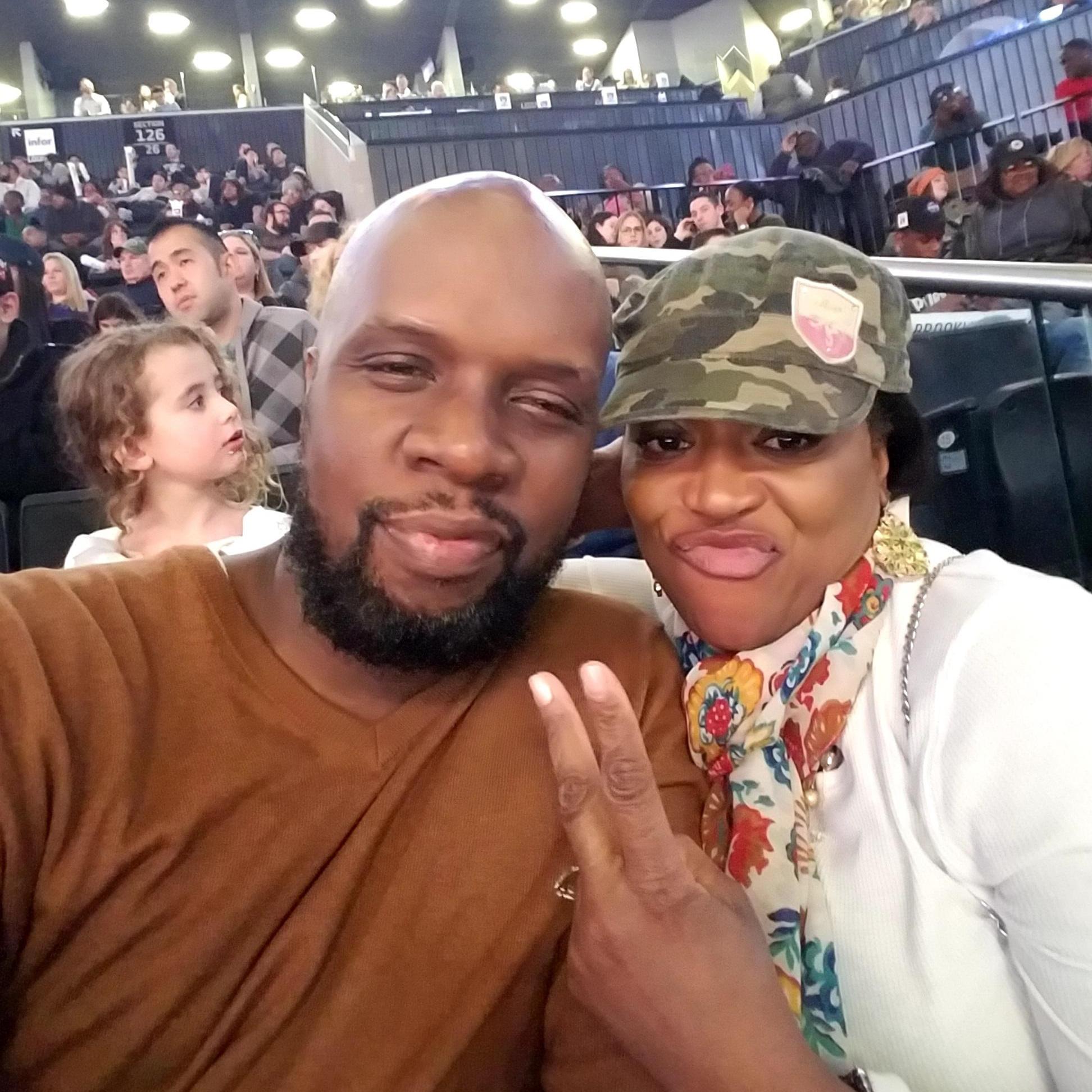 Barclay's Center chilling little girl behind us kept photo bombing our pics lol